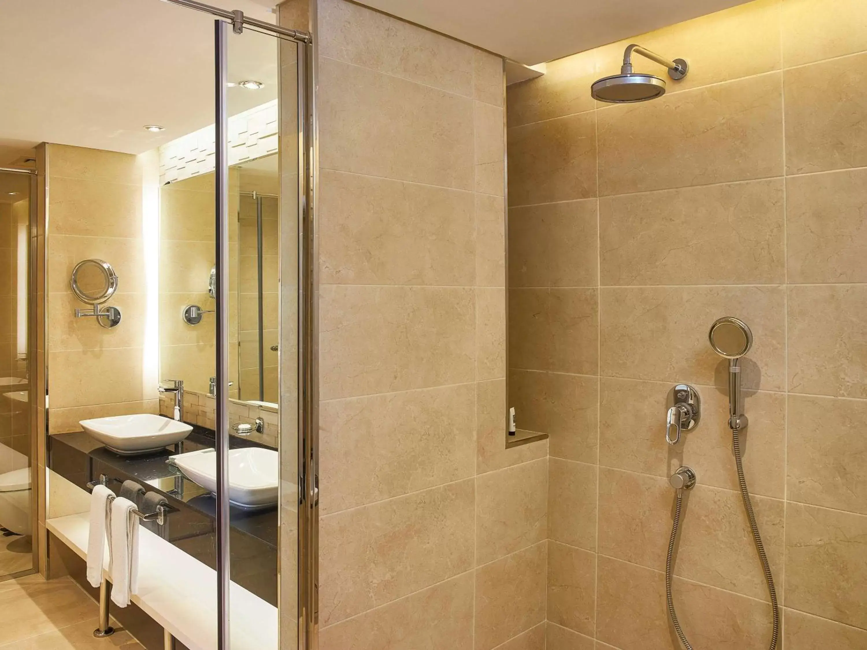 Photo of the whole room, Bathroom in Mercure Dubai Barsha Heights Hotel Suites