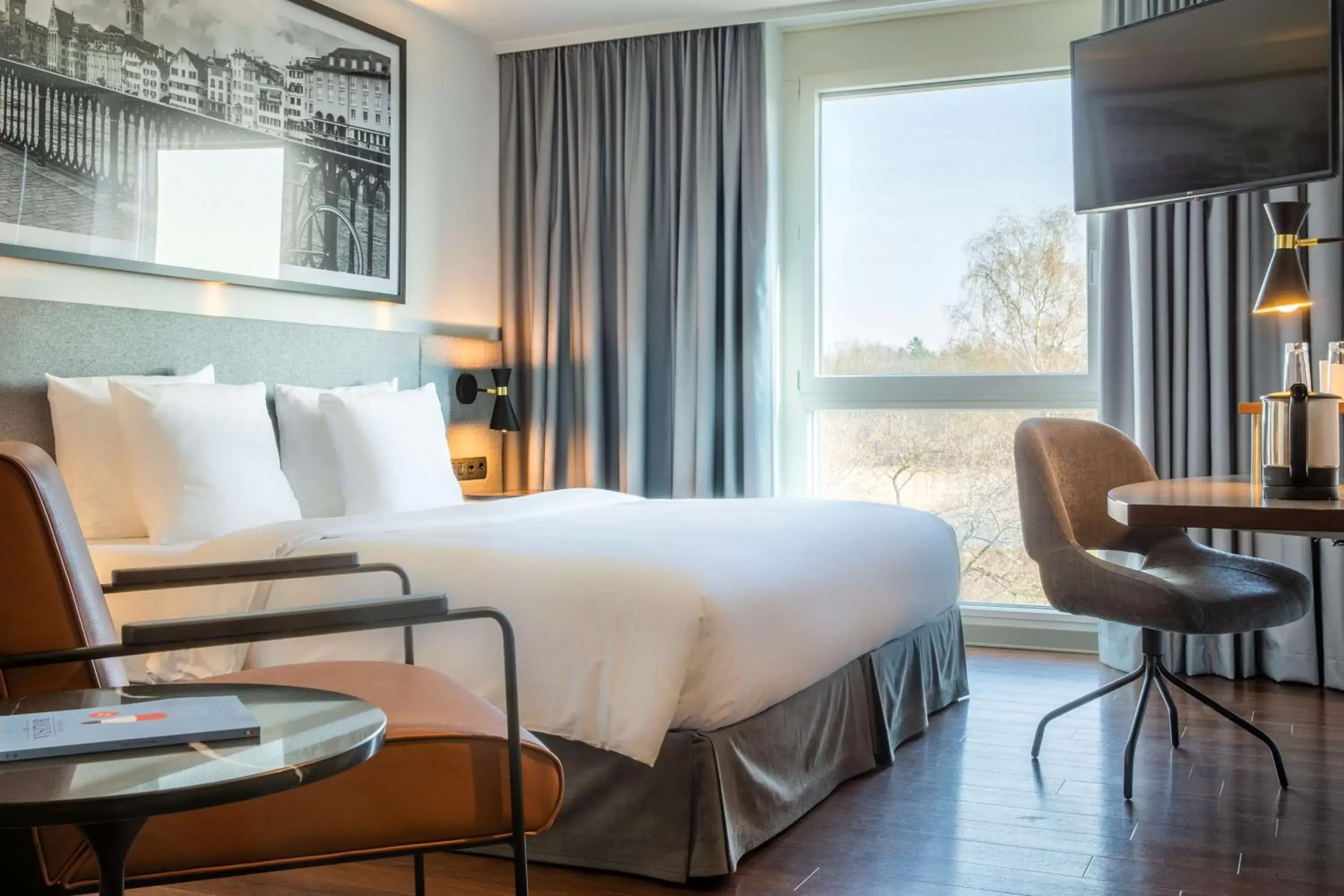 Photo of the whole room, Bed in Radisson Hotel Zurich Airport