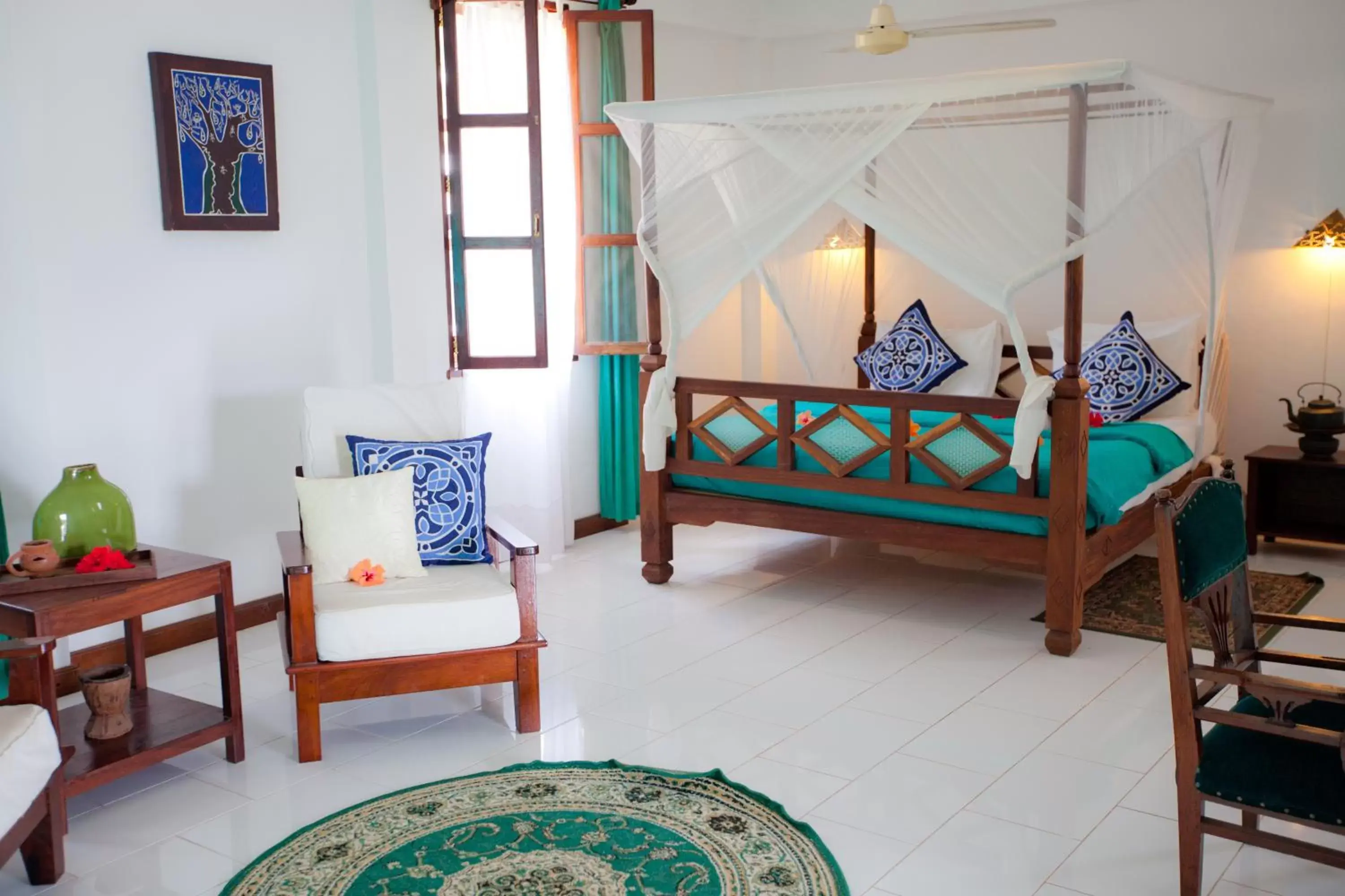 Bed in Flame Tree Cottages