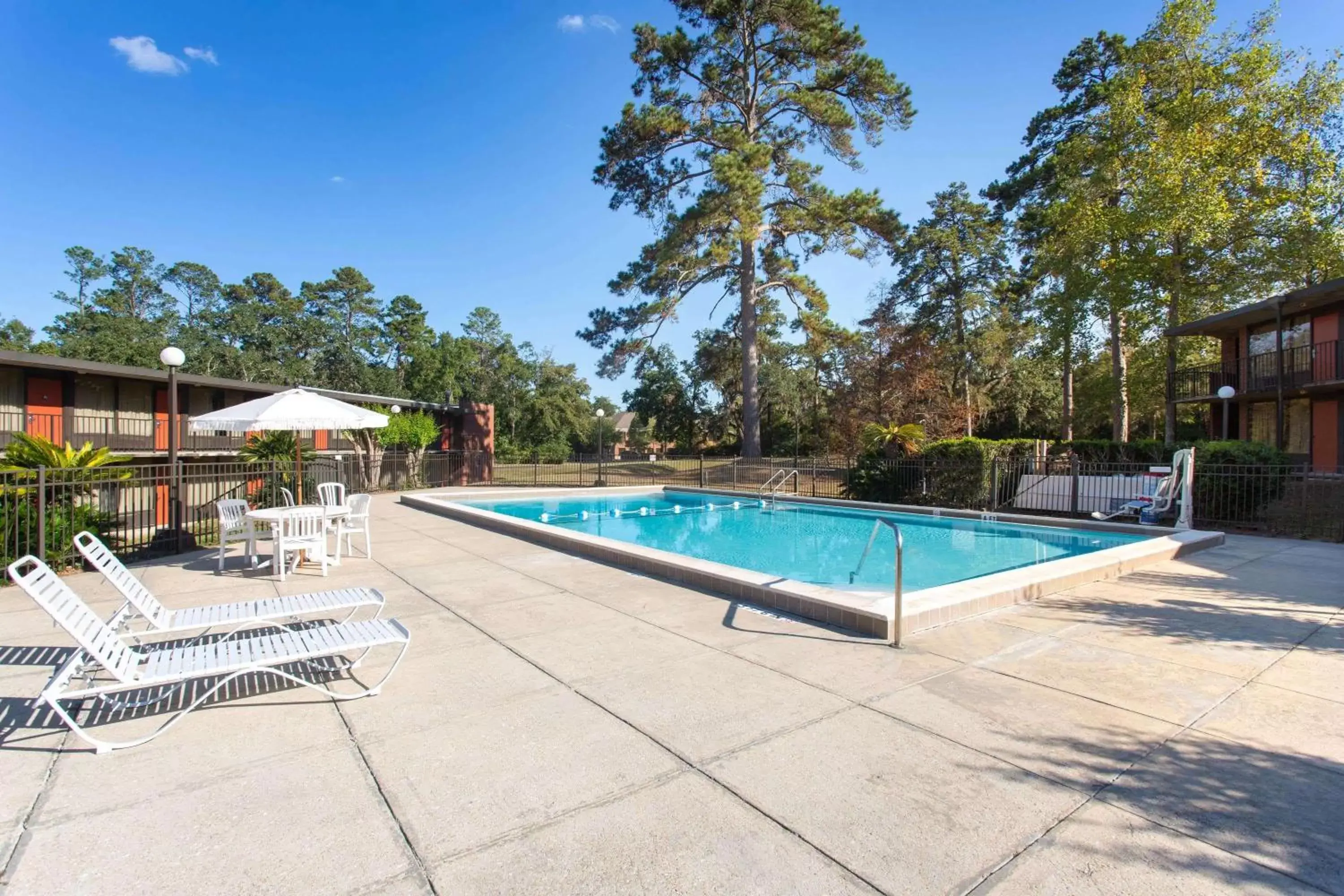 On site, Swimming Pool in Days Inn & Suites by Wyndham Tallahassee Conf Center I-10