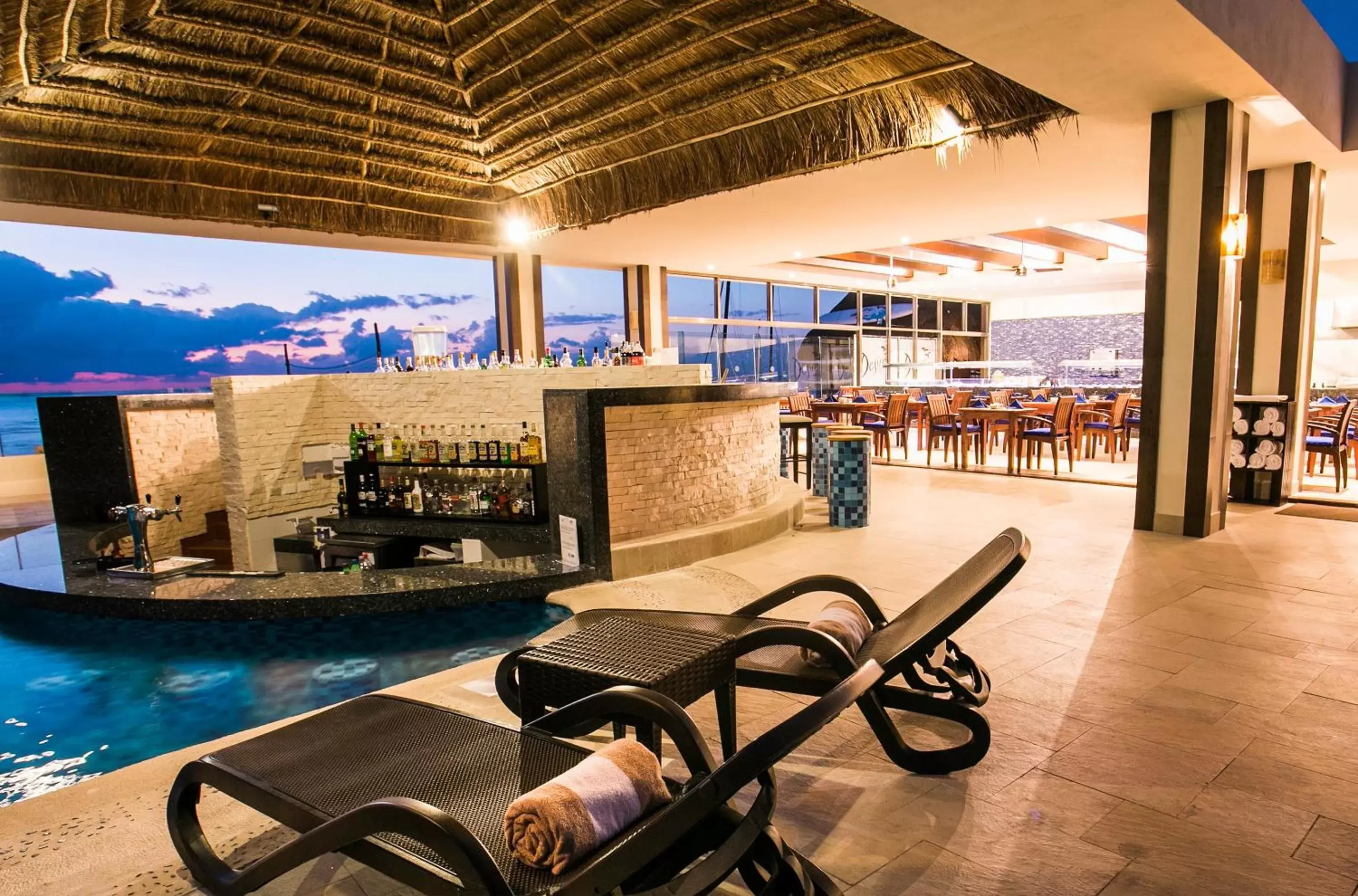 Lounge or bar, Swimming Pool in Desire Riviera Maya Resort