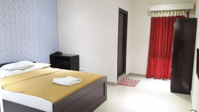 Bed in Star MSR Residency