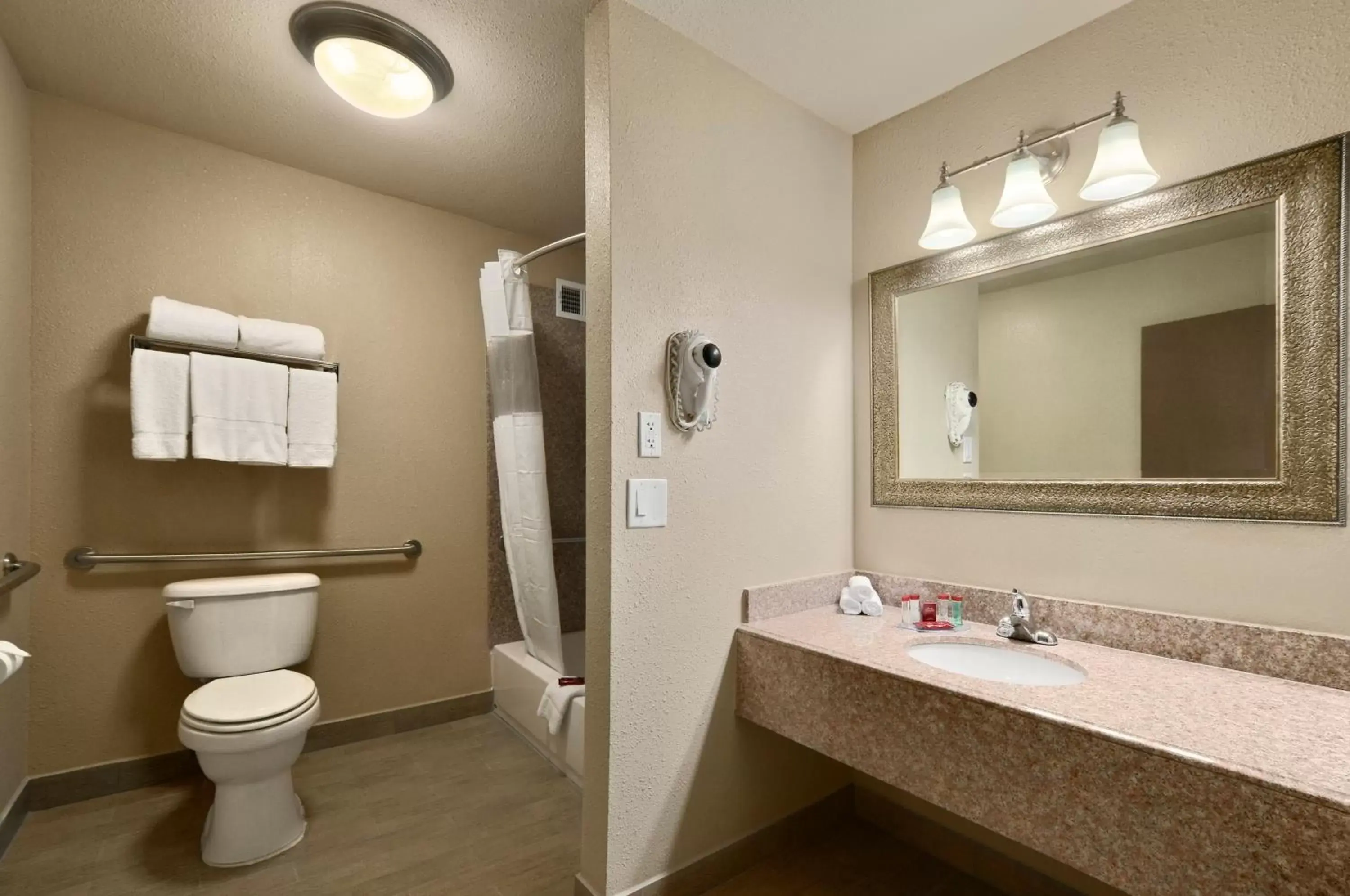 Bathroom in Ramada by Wyndham Houston Intercontinental Airport South