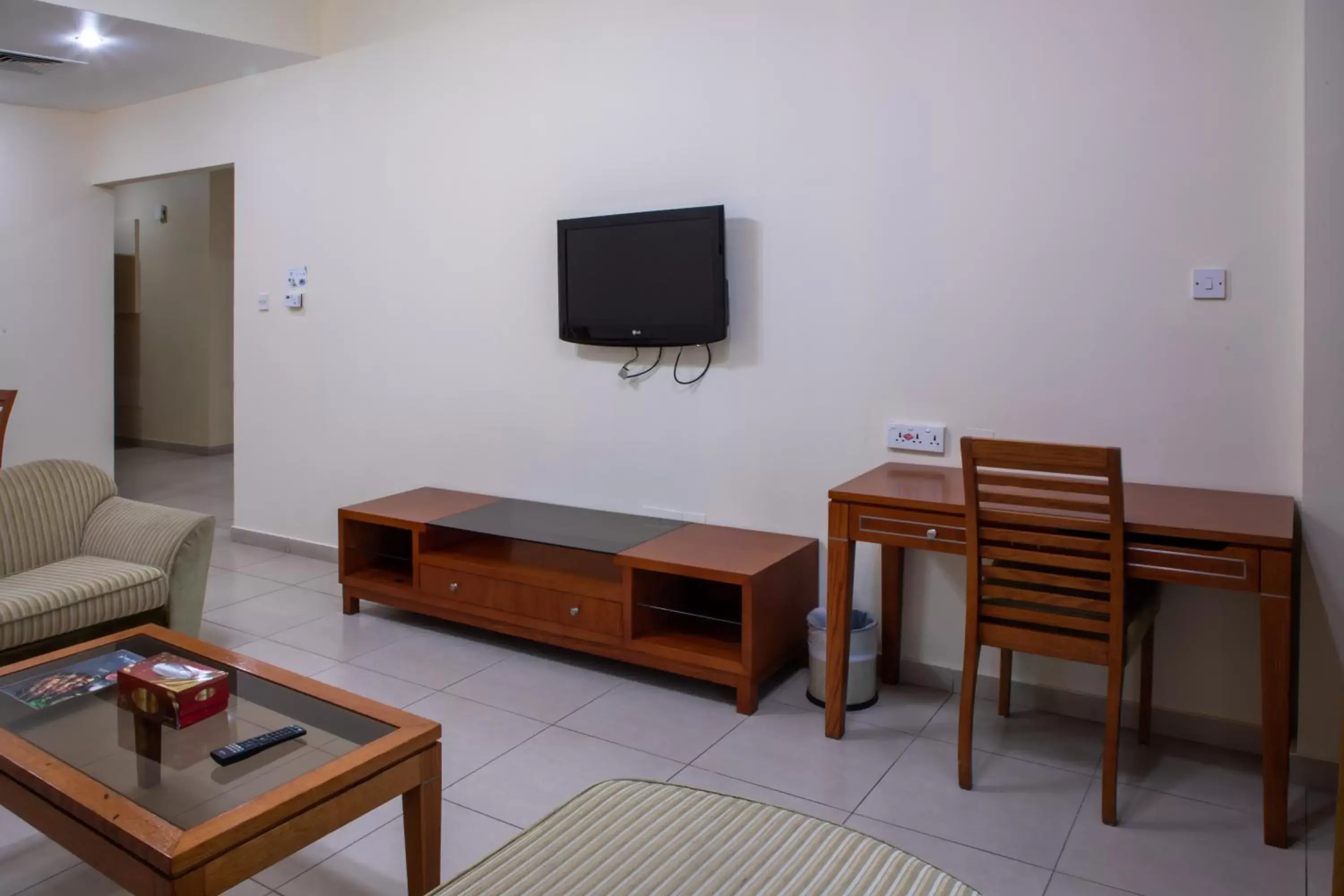 Living room in Wescott Plaza Hotel Apartments LLC Formerly West Zone Plaza Hotel Apts Living room in Wescott Plaza Hotel Apartments LLC Formerly West Zone Plaza Hotel Apts