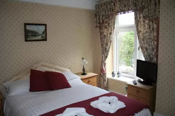 Bed in The Abbey Inn