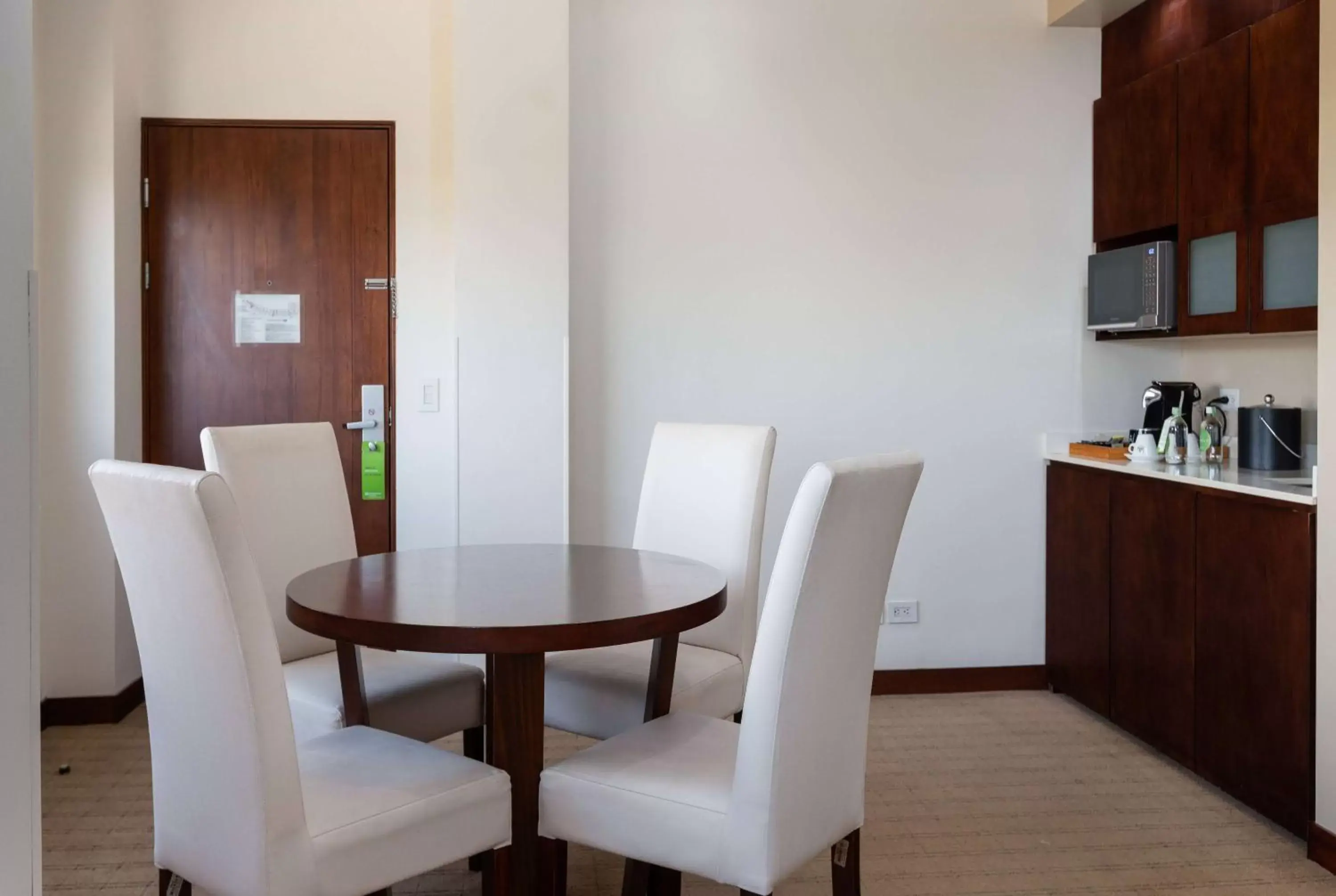 Bed, Dining Area in Wyndham Garden San Jose Escazu, Costa Rica