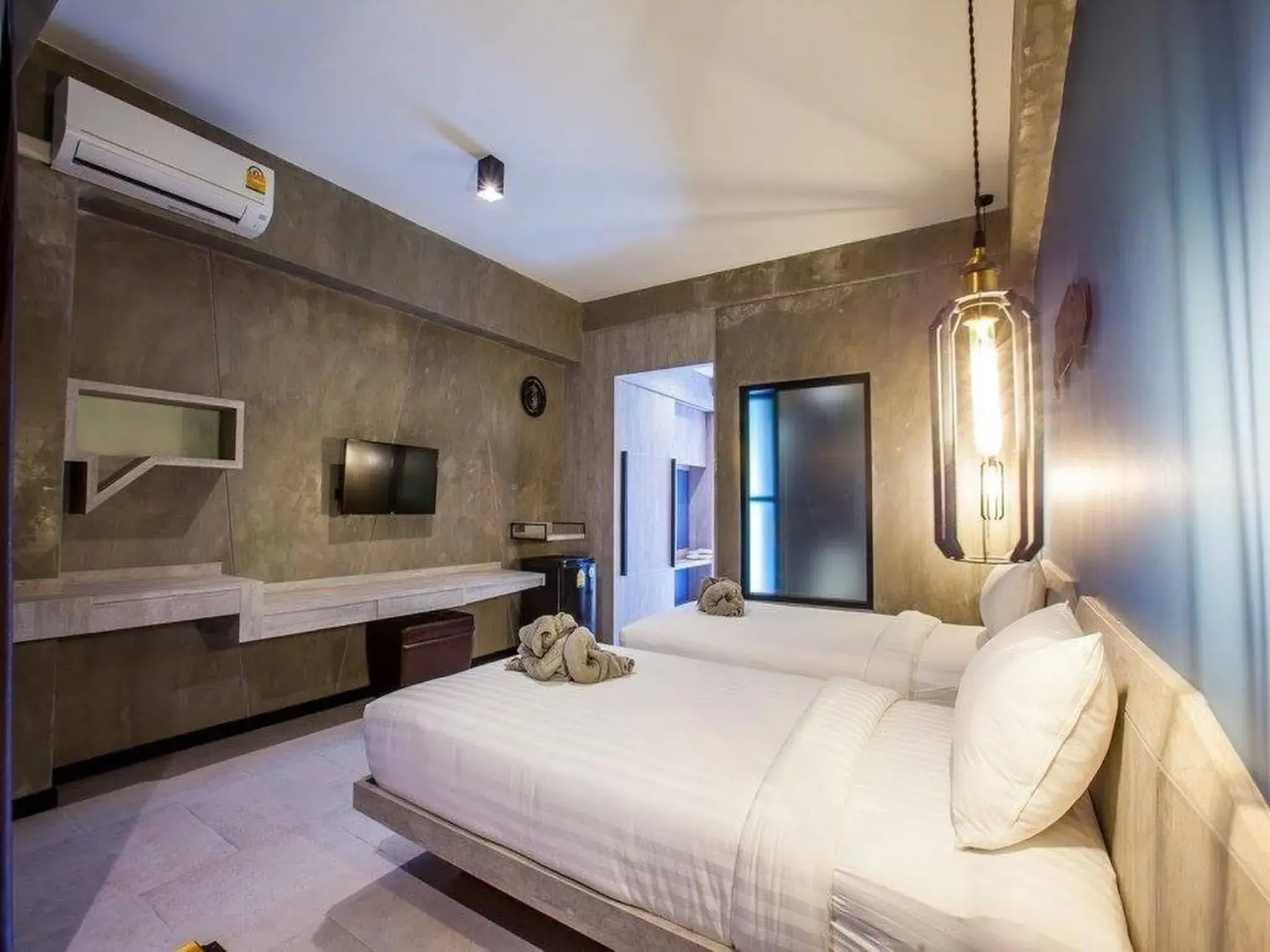 Bedroom in Loft Mania Boutique Hotel (SHA Extra Plus)