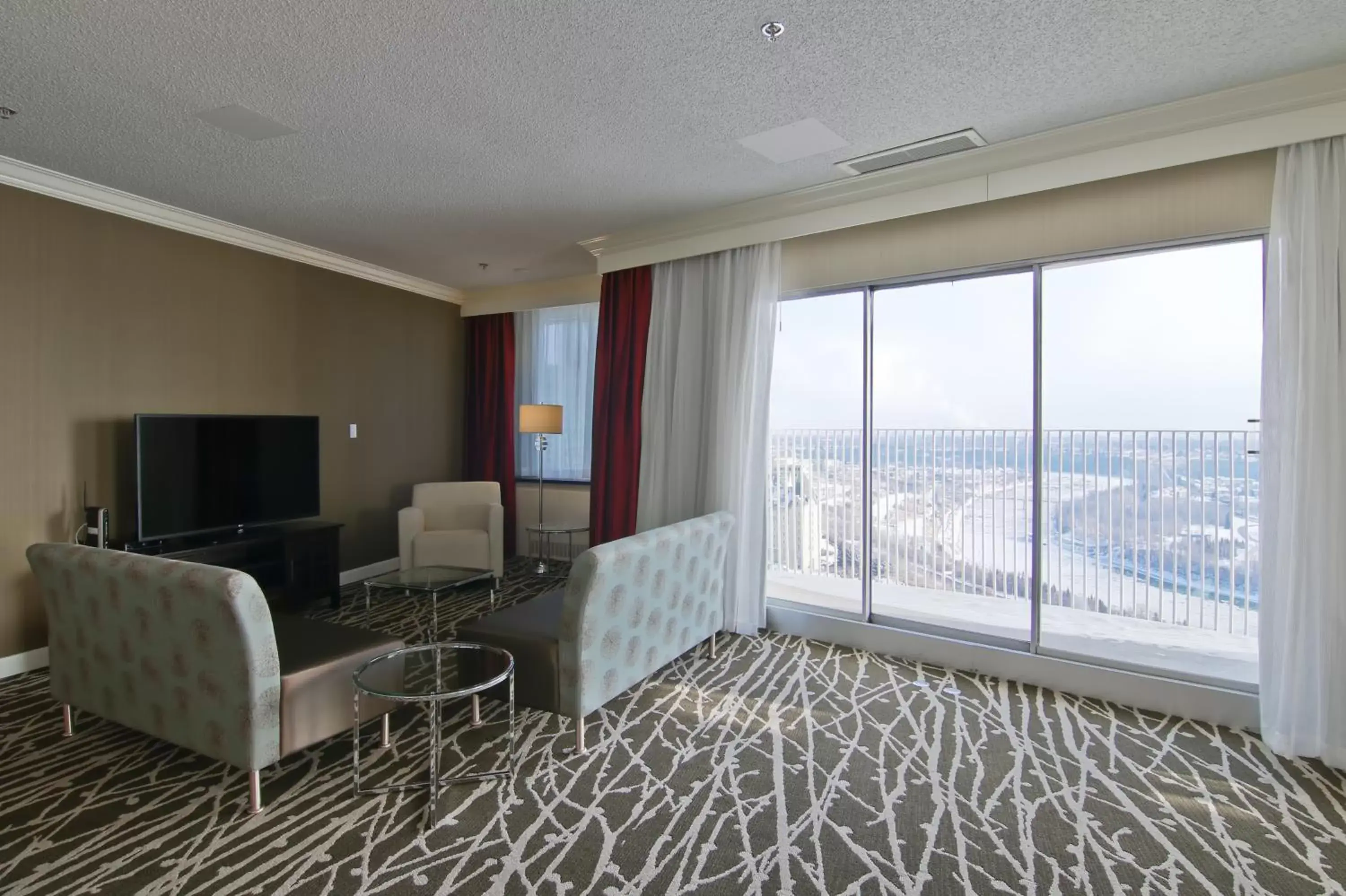 Living room, TV/Entertainment Center in Chateau Lacombe Hotel