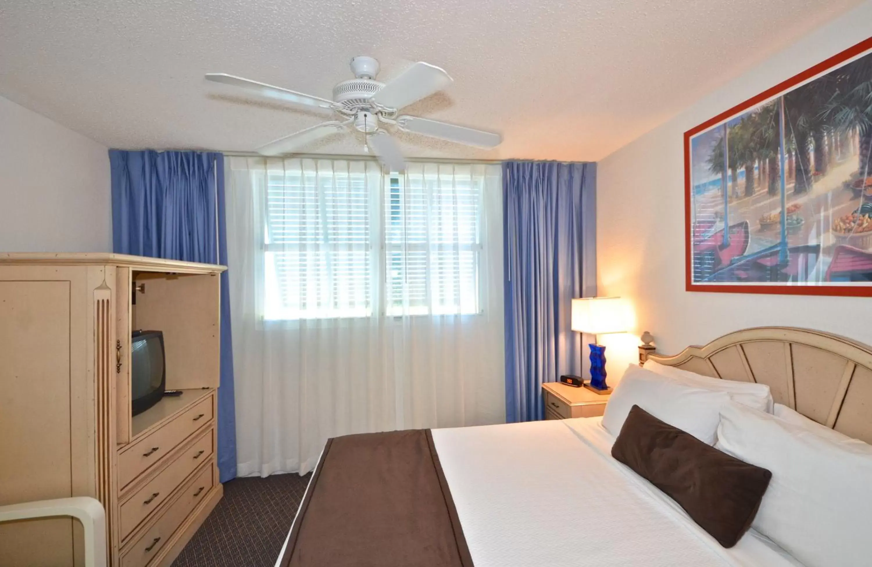 Bed in Sunrise Suites Barbados Suite #204