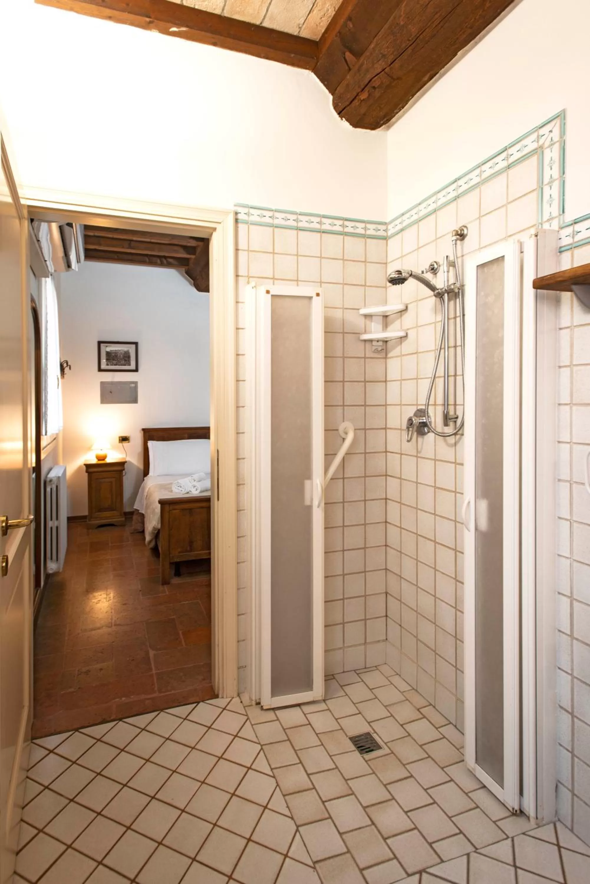 Shower, Bed in Residence Antico Borgo