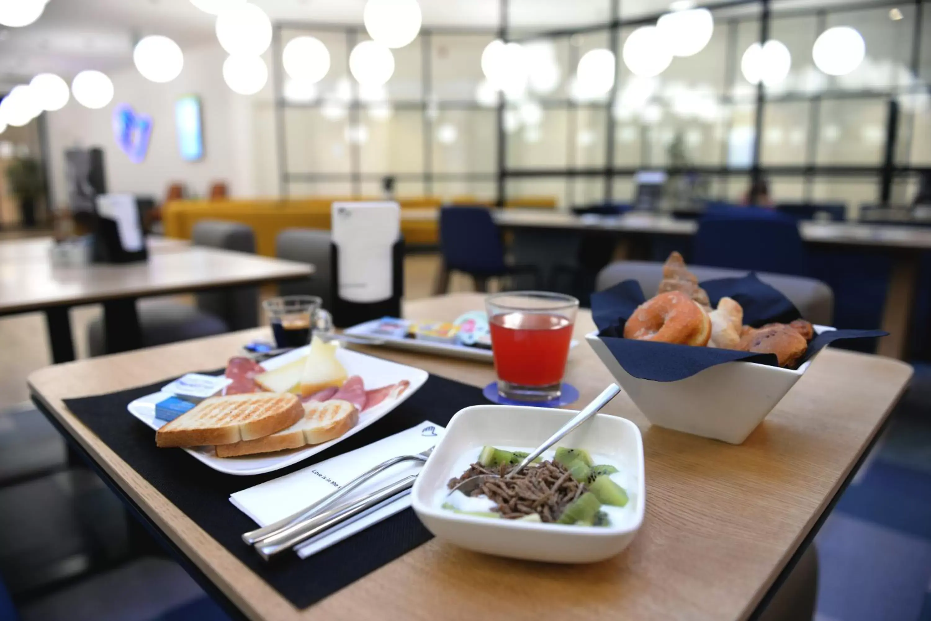 Food close-up in Air Rooms Rome Airport by HelloSky