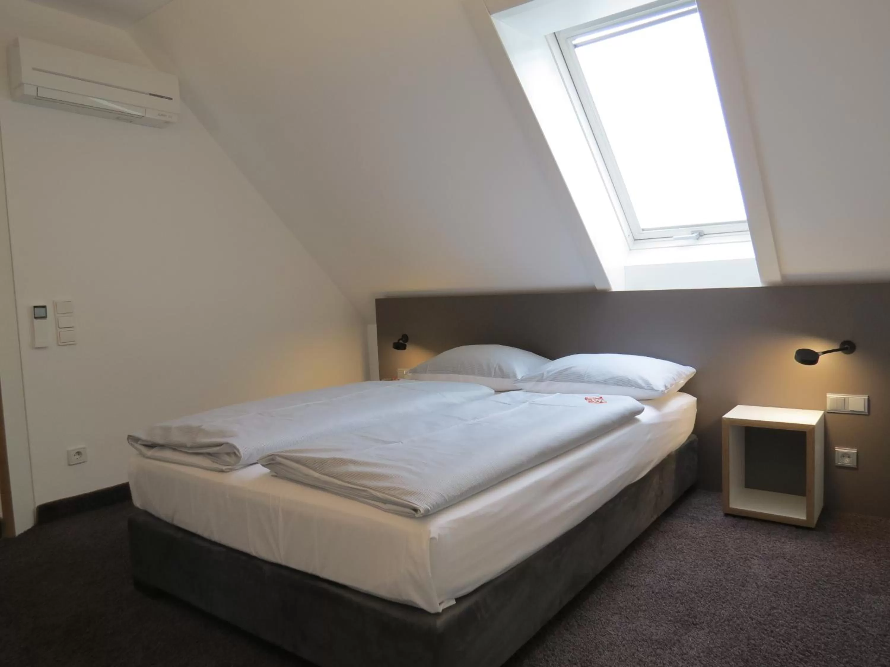 Bed in Comfor Hotel Ulm City