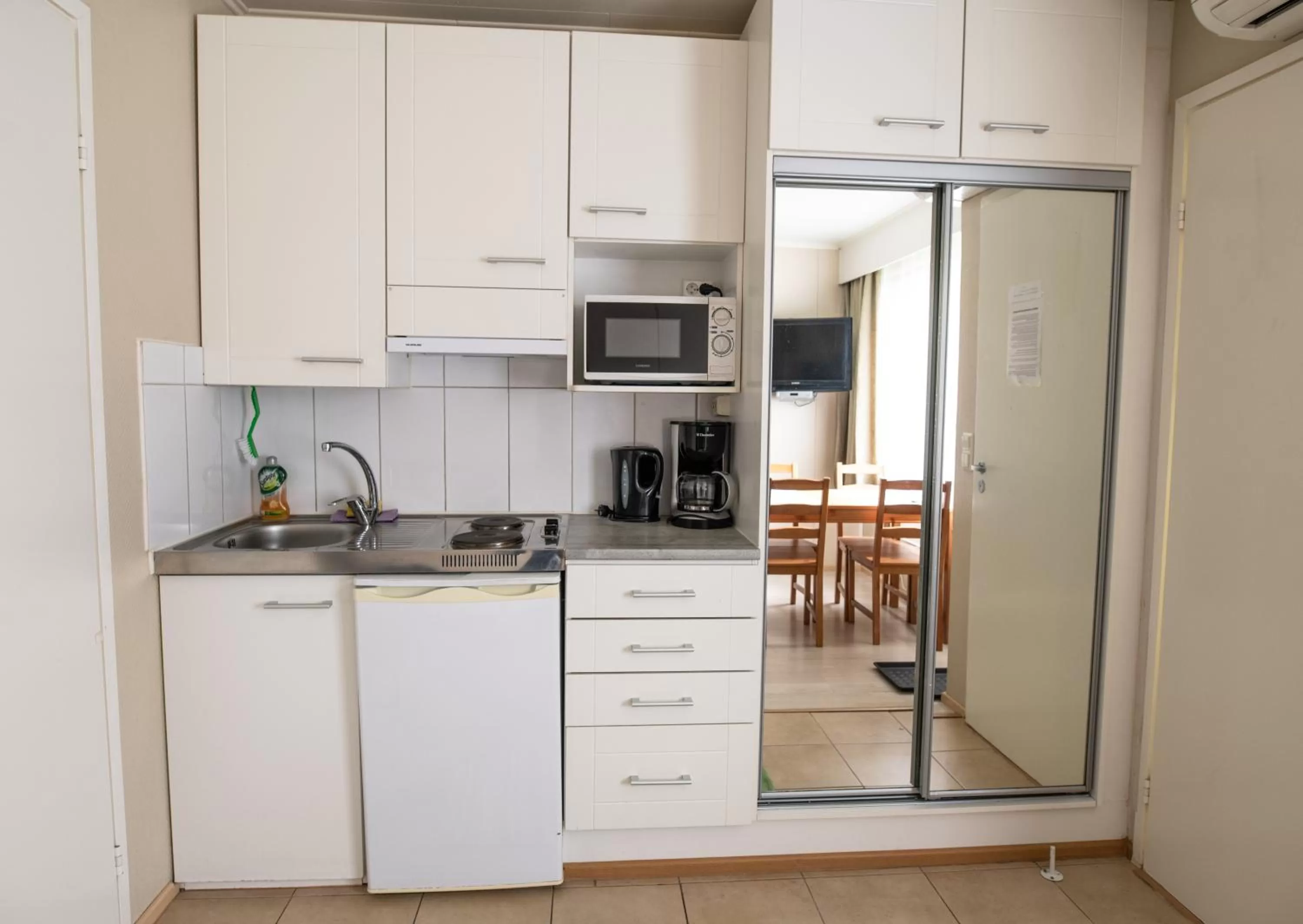 Kitchen or kitchenette in Motelli Rovaniemi