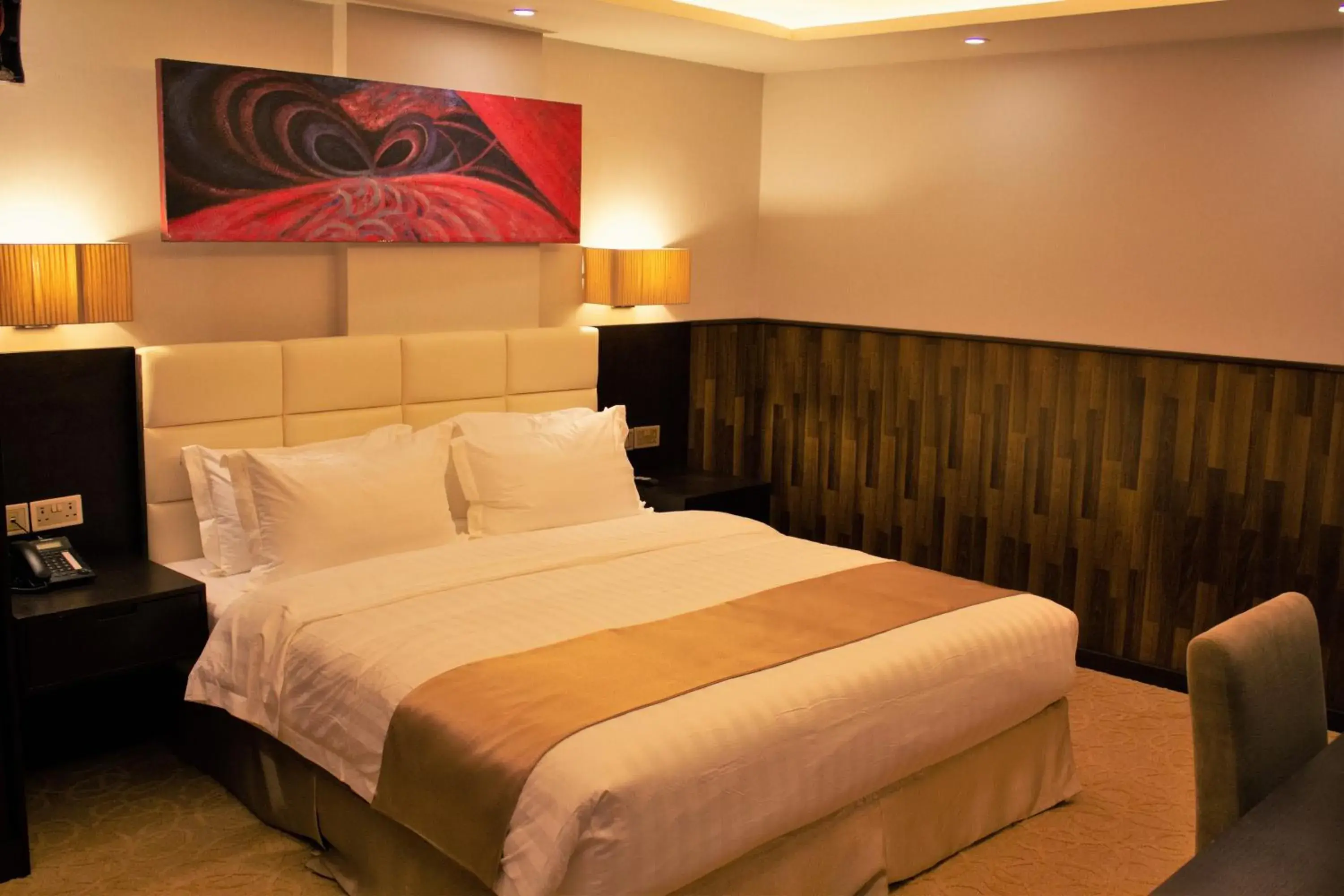 Bed in The Secure Inn Hotel Muscat