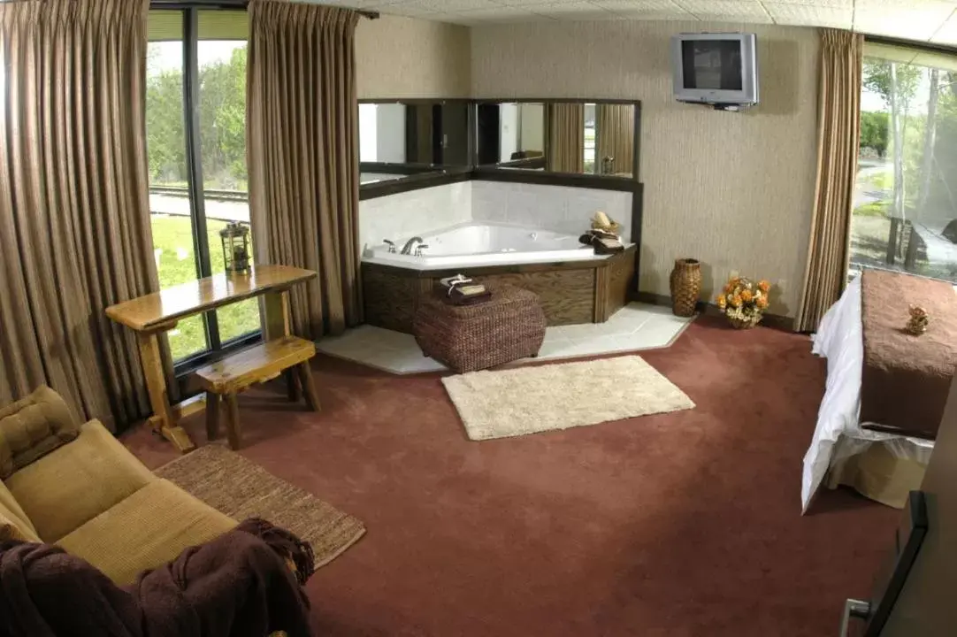 Photo of the whole room, Bathroom in RiverBank Lodge