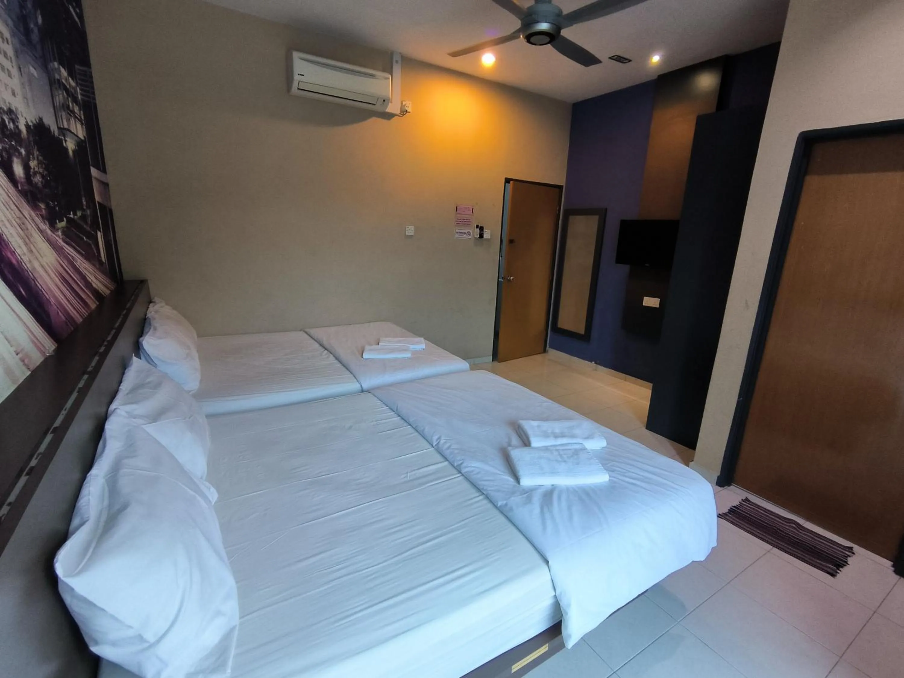 Bed in GOLDEN GUEST HOUSE KUANTAN