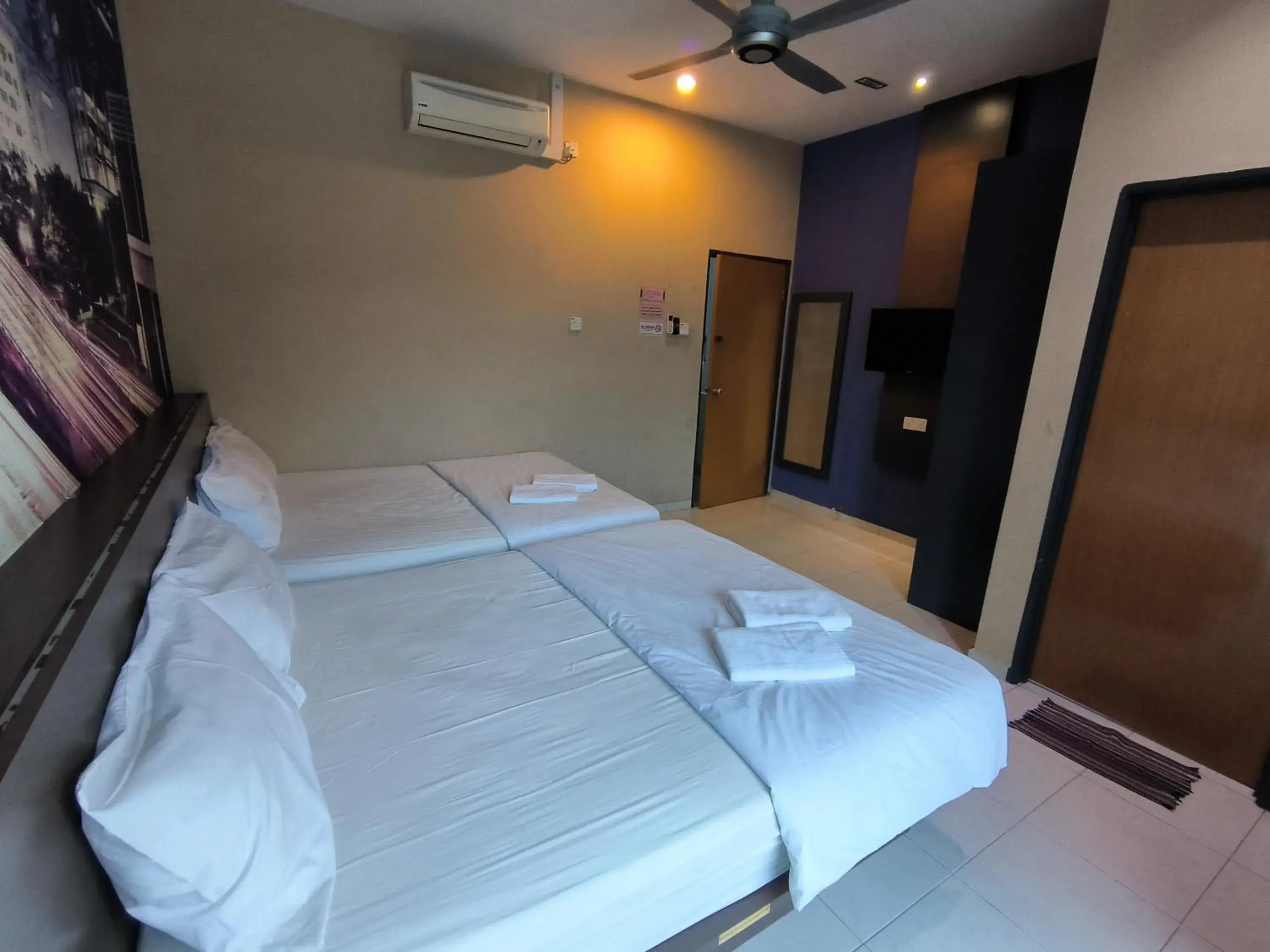 Bed in GOLDEN GUEST HOUSE KUANTAN