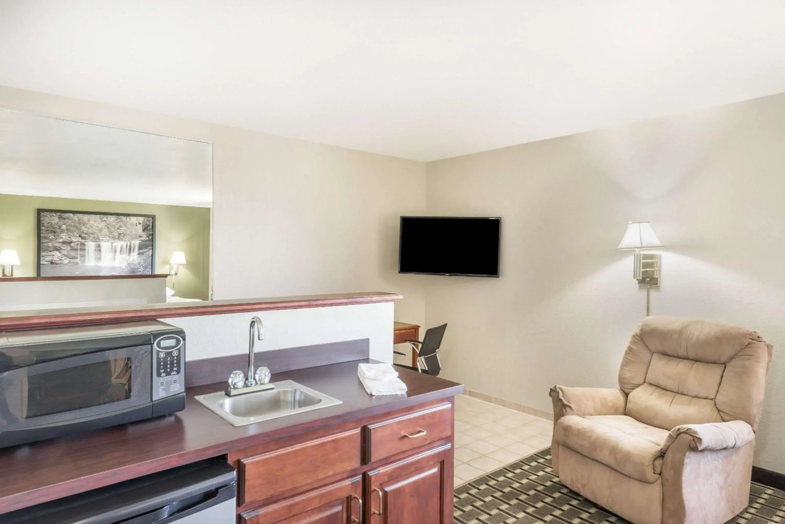 Photo of the whole room, TV/Entertainment Center in Super 8 by Wyndham Madison/Hanover Area