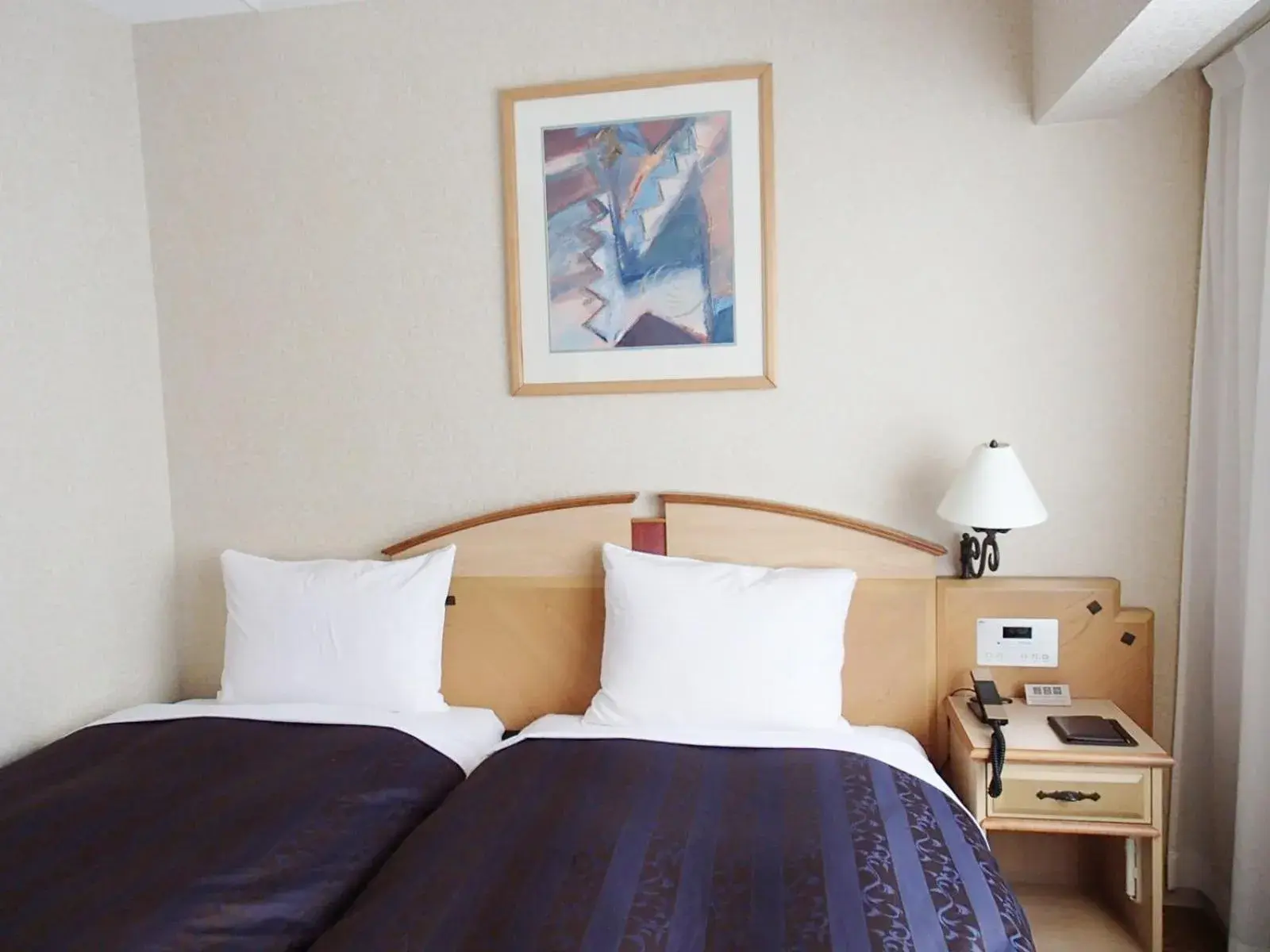 Photo of the whole room, Bed in Hotel Resol Sapporo Nakajima Koen