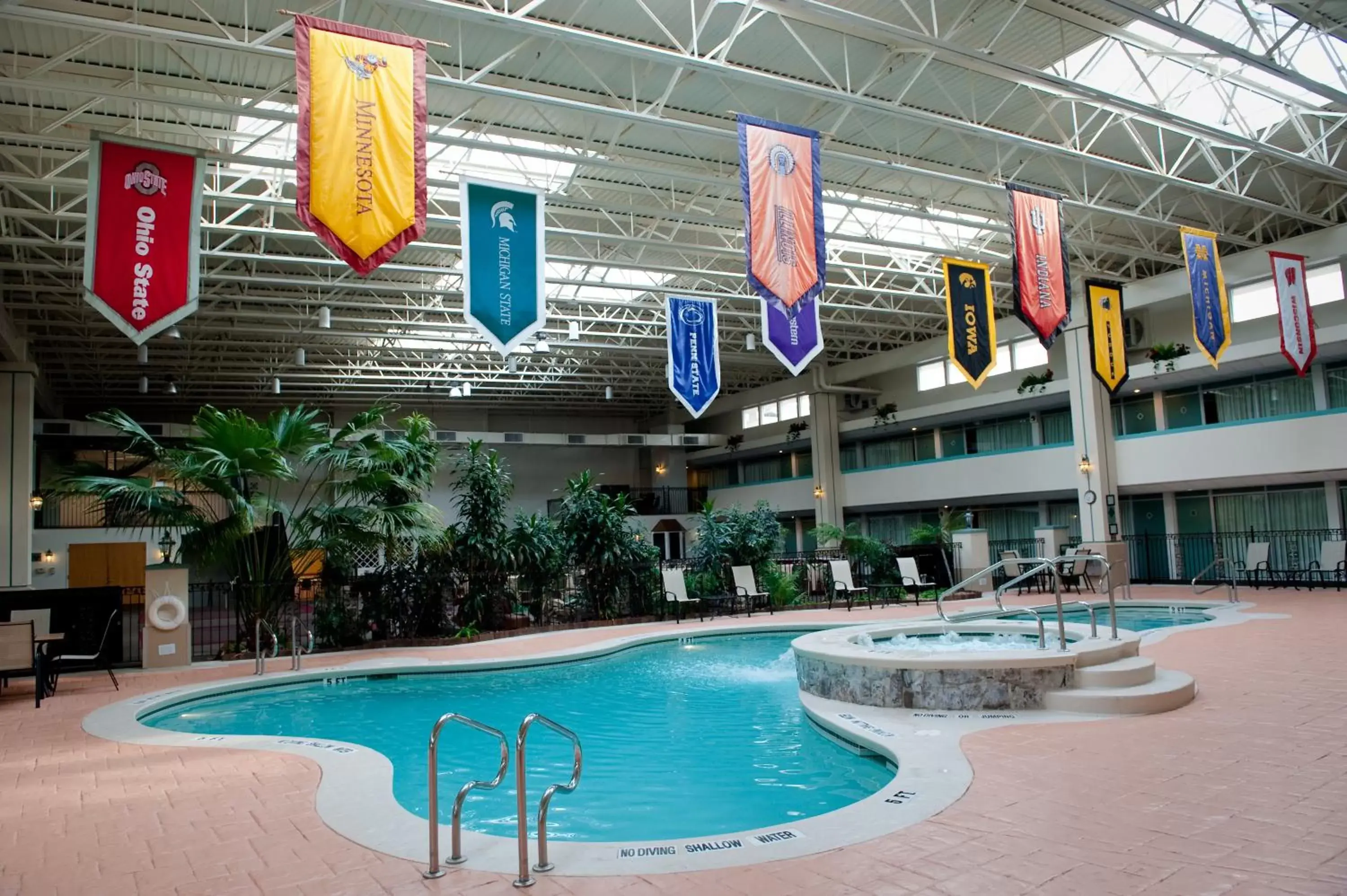 Swimming Pool in Ramada by Wyndham State College Hotel & Conference Center