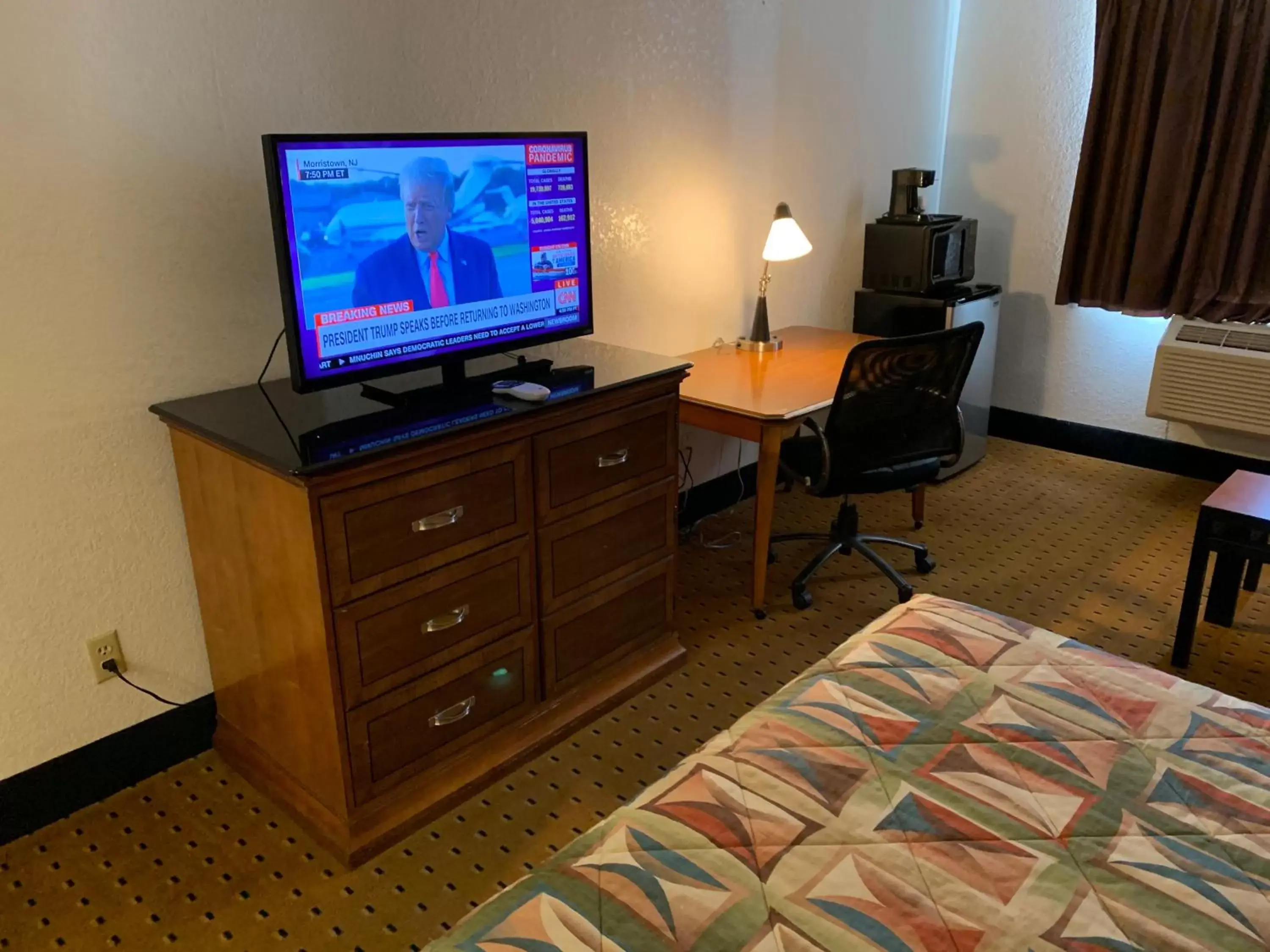 Photo of the whole room, TV/Entertainment Center in Brentwood Inn & Suites