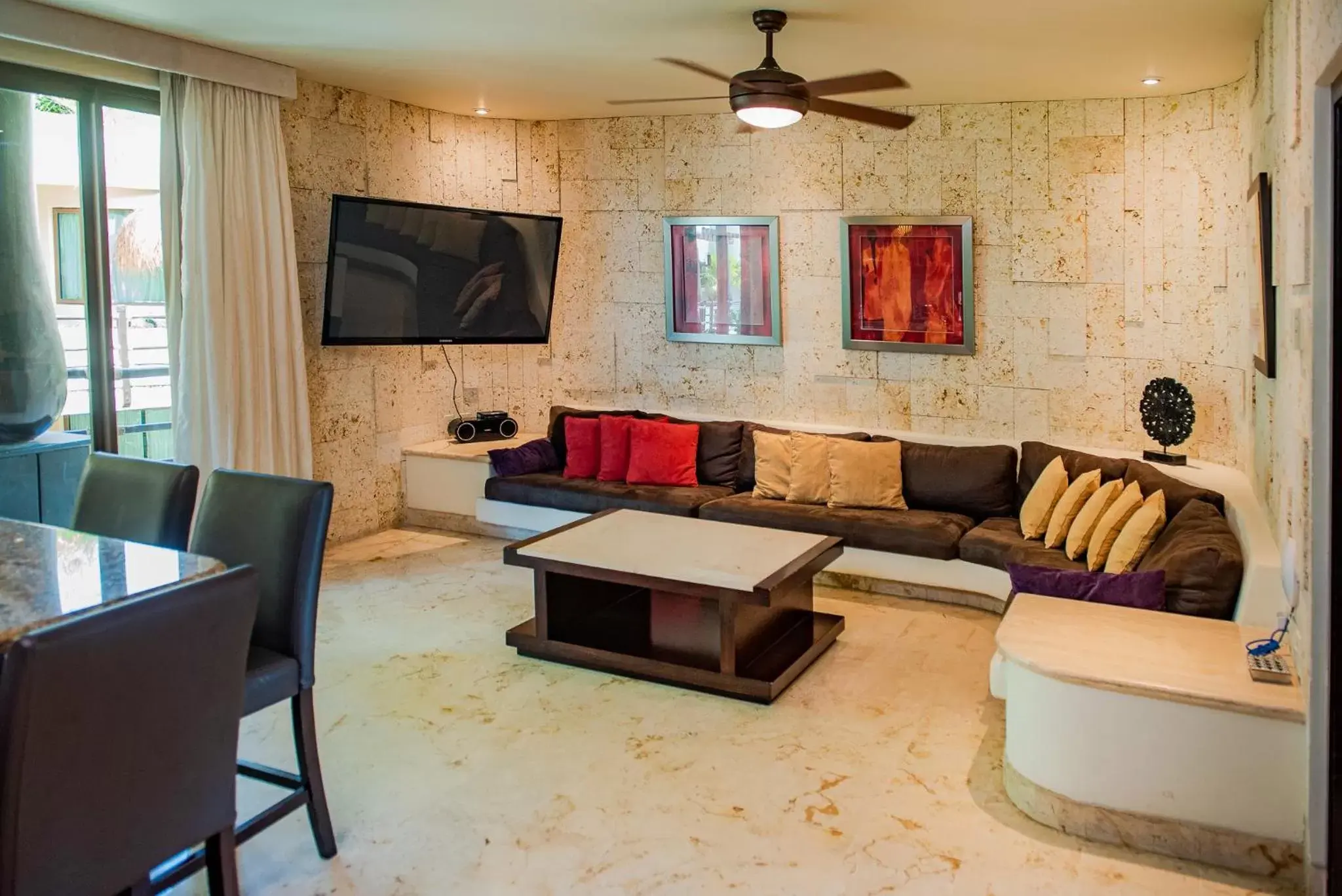 TV and multimedia, Seating Area in El Taj Oceanfront and Beachside Condo Hotel