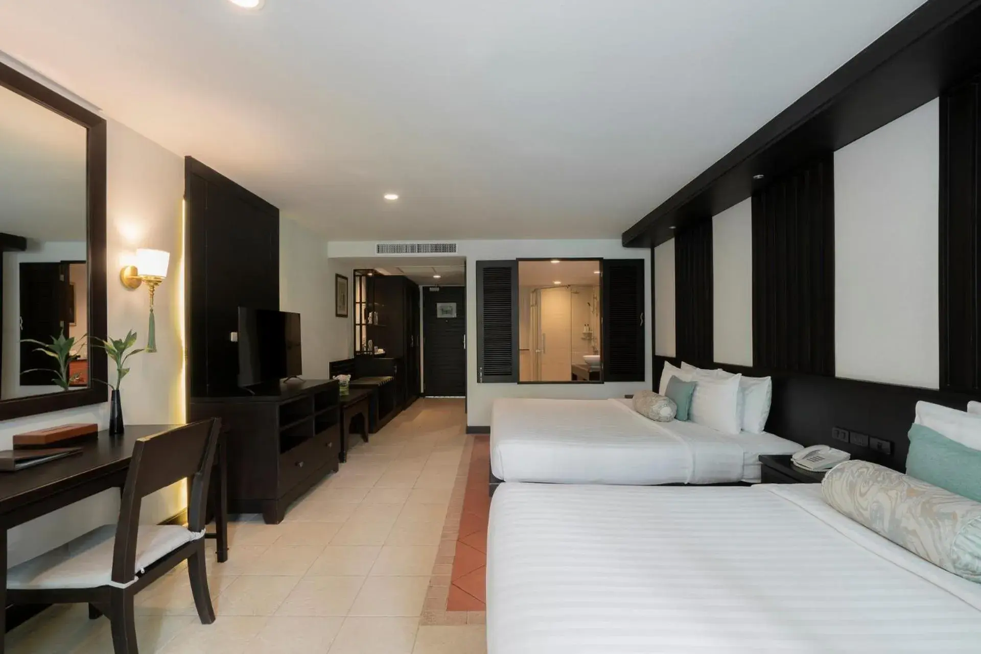 Bedroom in Ravindra Beach Resort & Spa - SHA Extra Plus