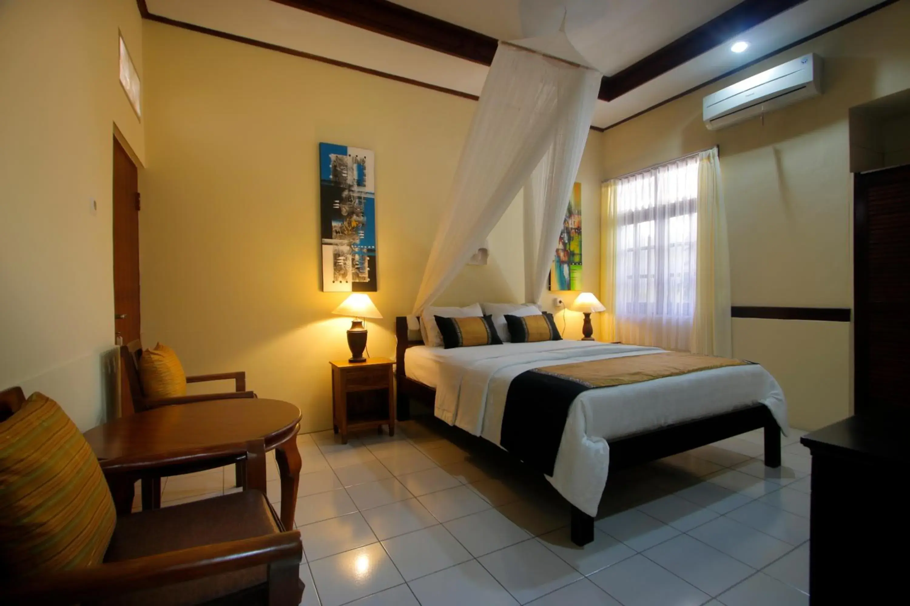 Seating area, Bed in Hotel Jati Sanur