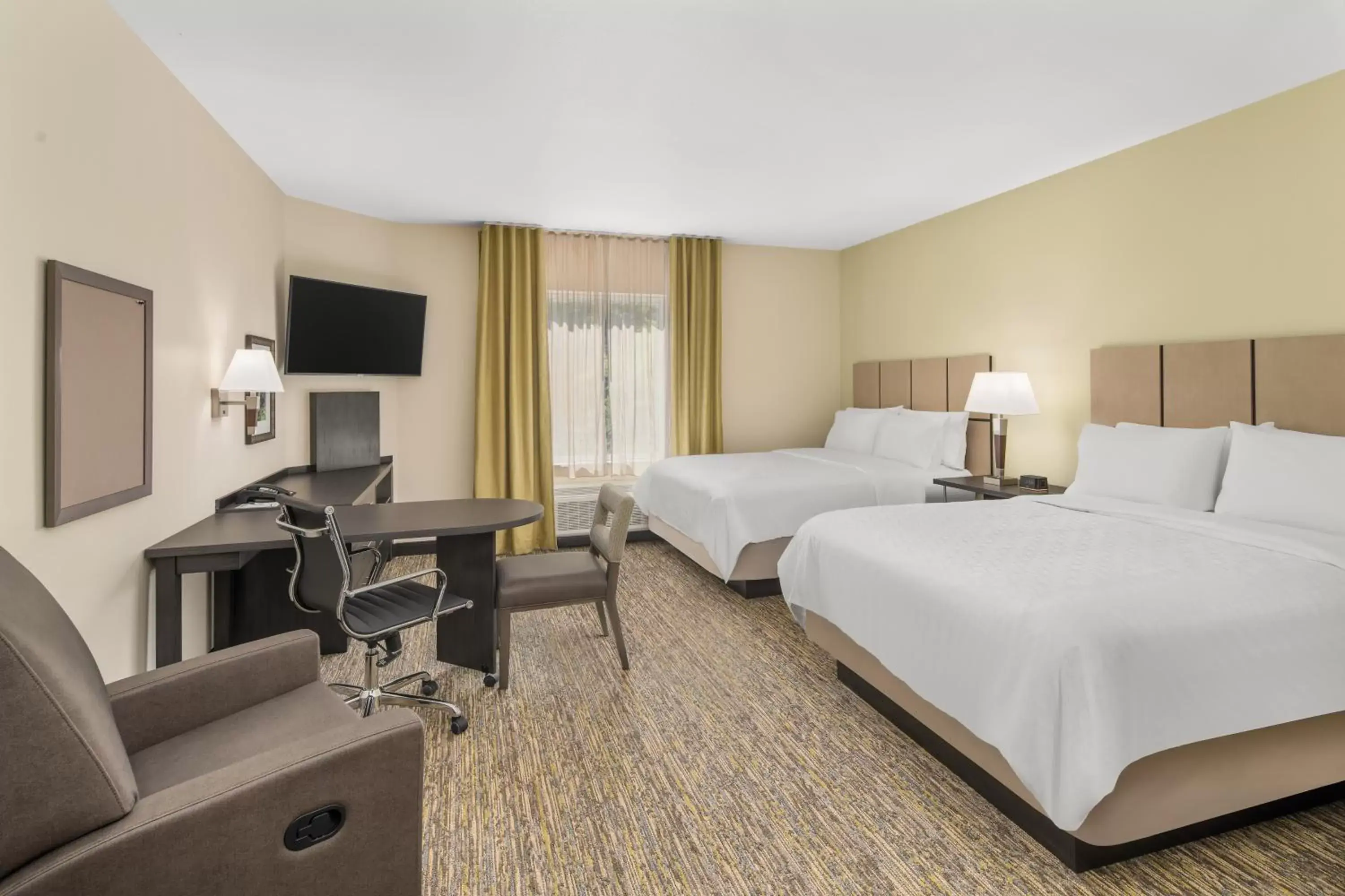 Bed in Candlewood Suites - Newnan - Atlanta SW, an IHG Hotel