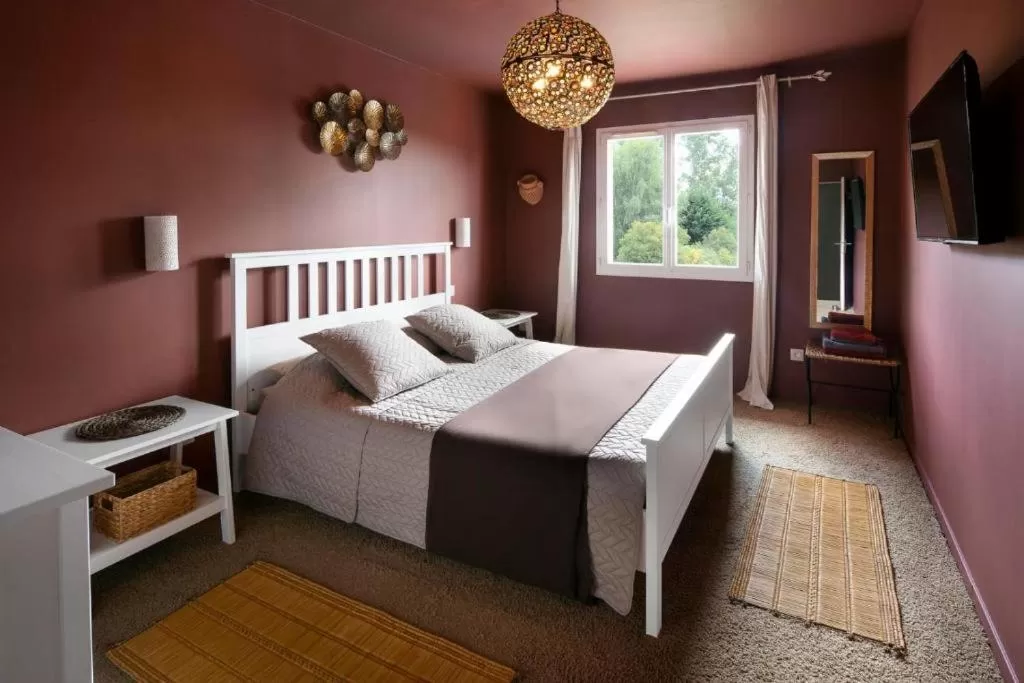 Bed in La perle rouge A Panazol