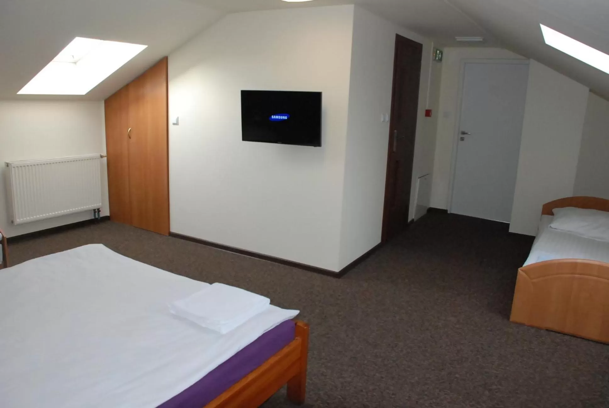 Bed in Hotelik Manhatan