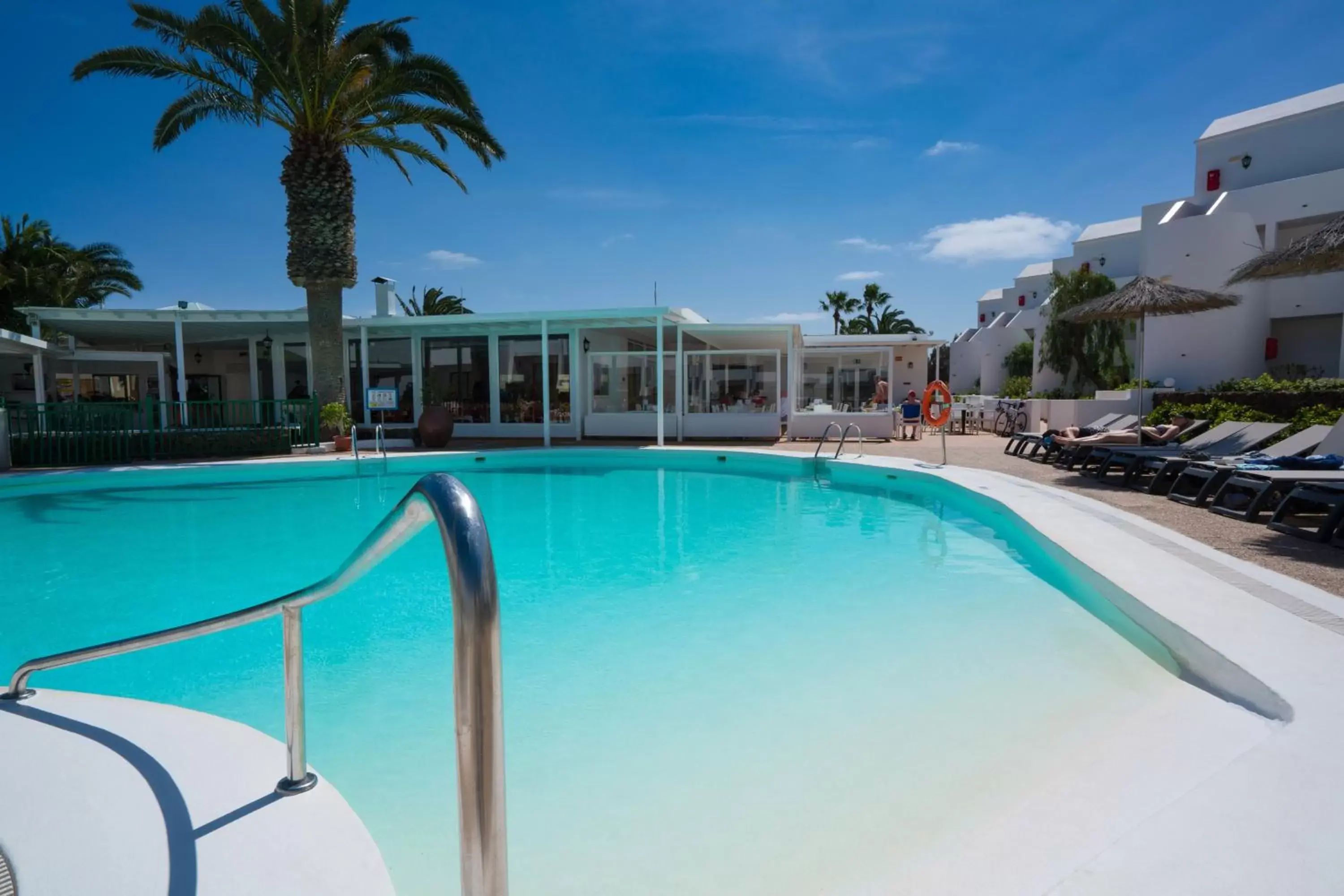 Lounge or bar, Swimming Pool in Hotel Club Siroco - Adults Only