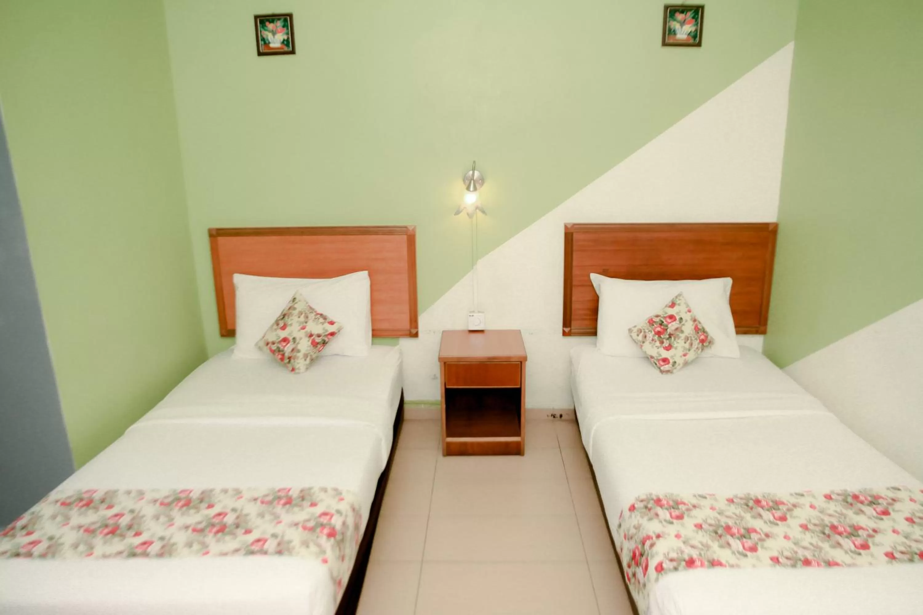 Bed in HOTEL D VIEW MERSING