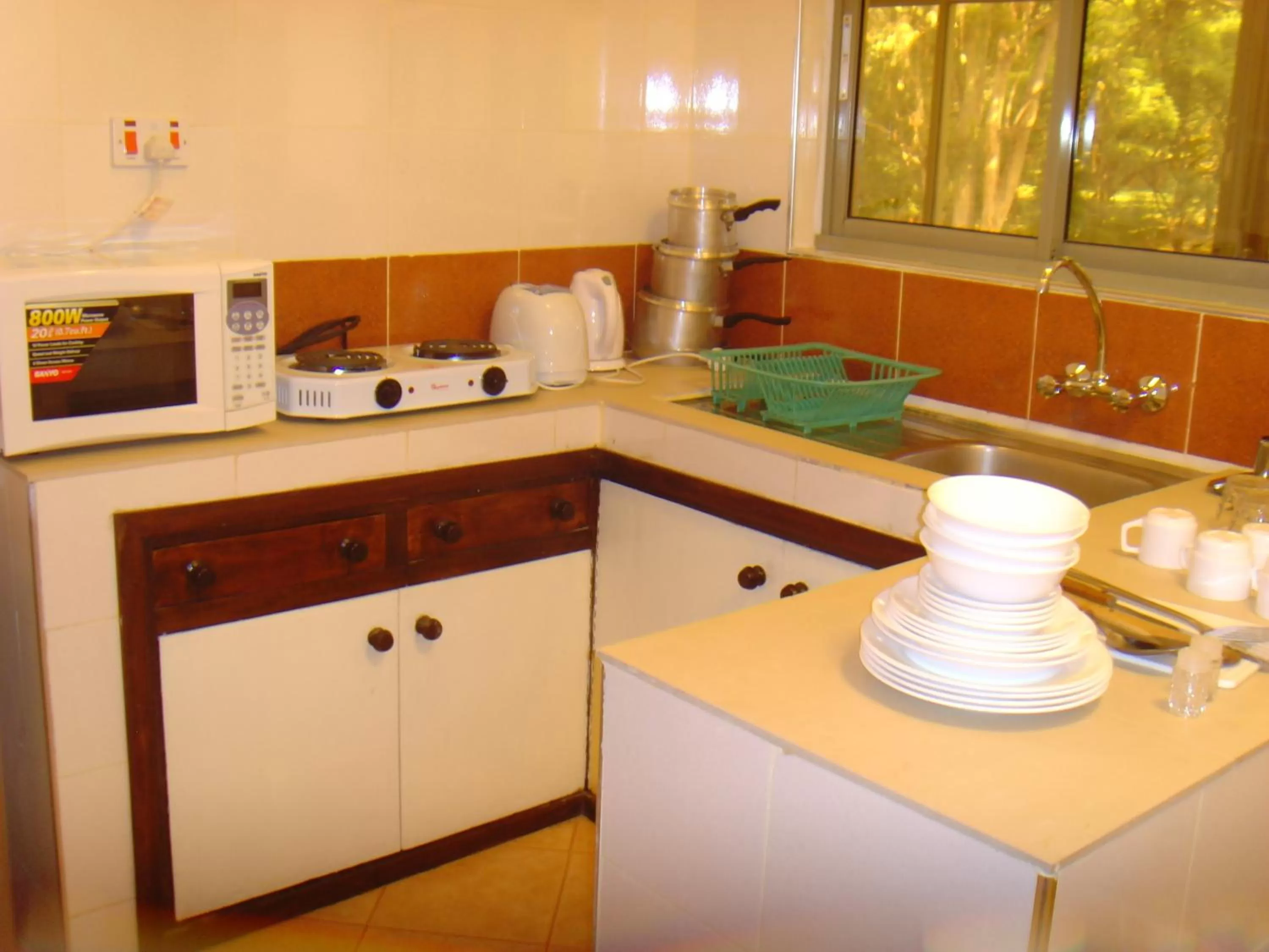 Kitchen or kitchenette in Kenya Comfort Suites