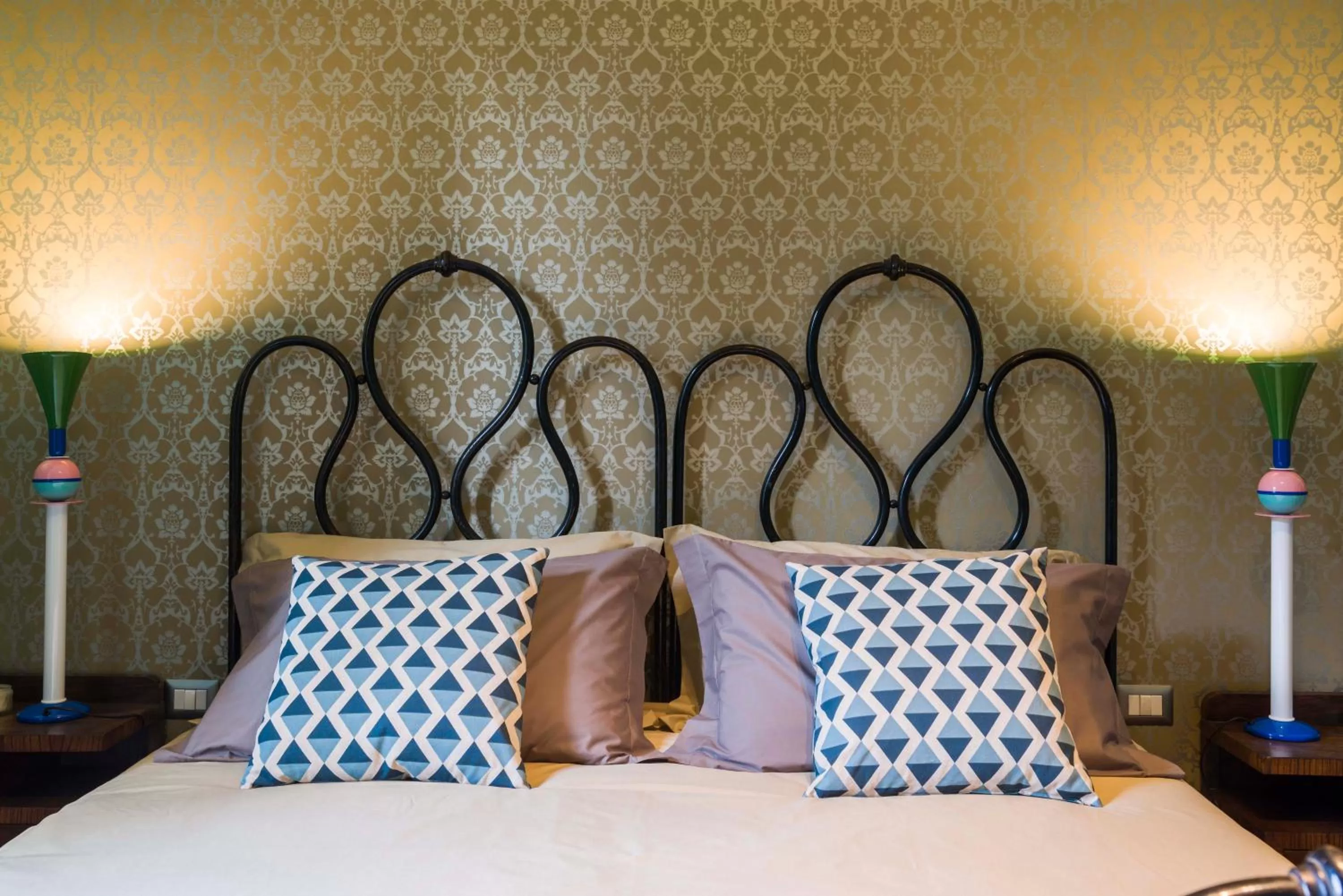 Bed in Frími Boutique Rooms b&b