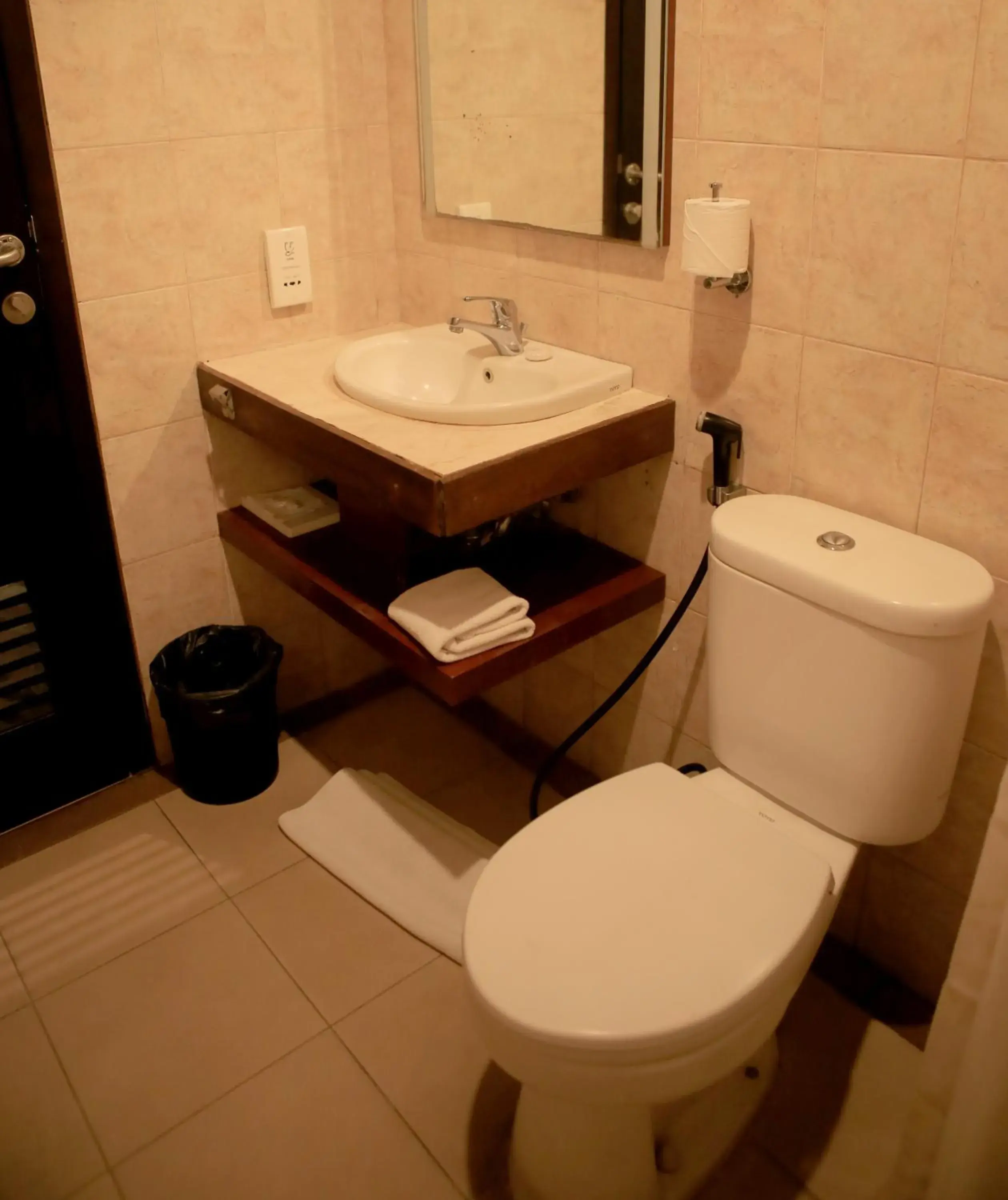 Property building, Bathroom in Grand Kuta Hotel And Residence