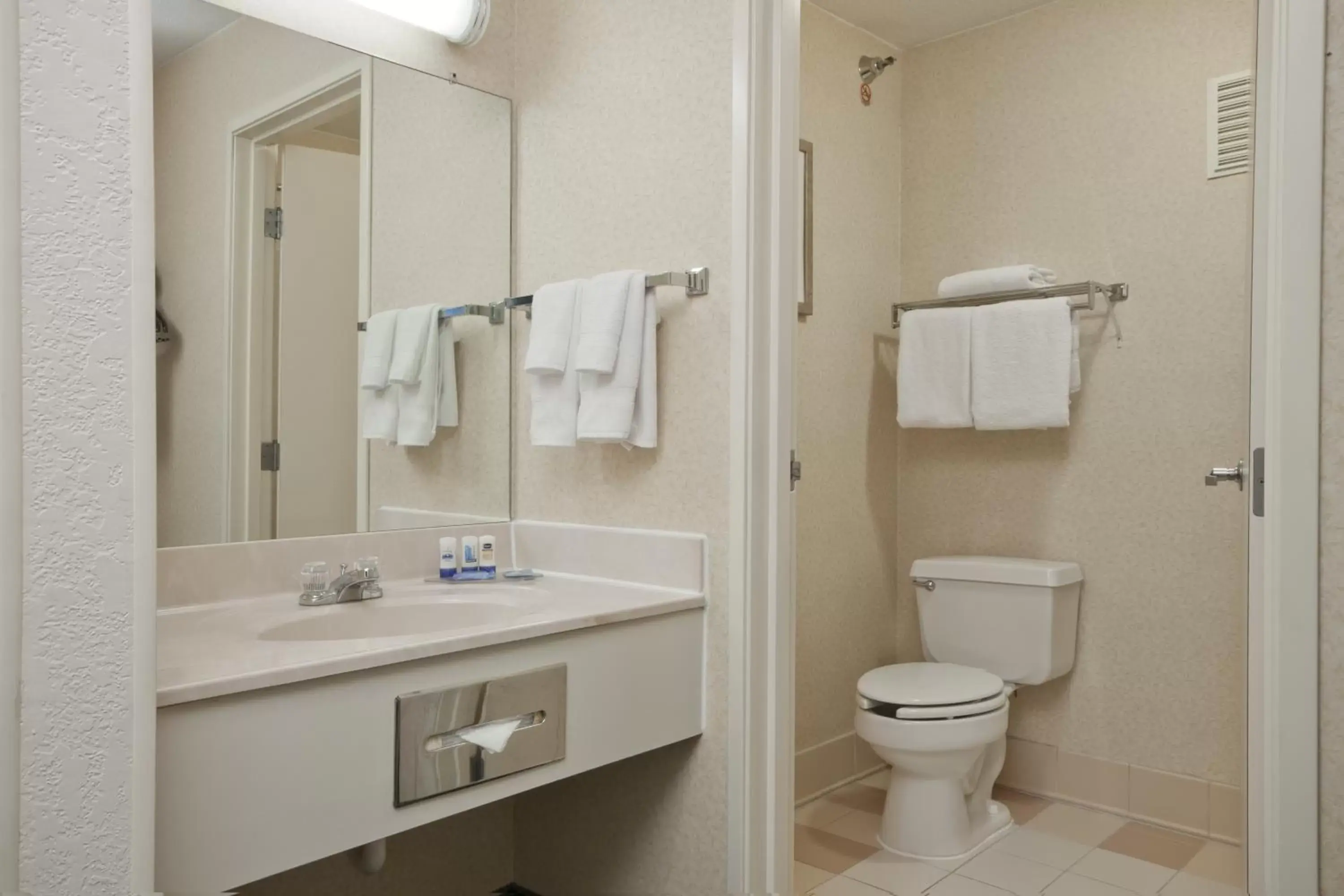 Toilet, Bathroom in Wingate by Wyndham Sioux City