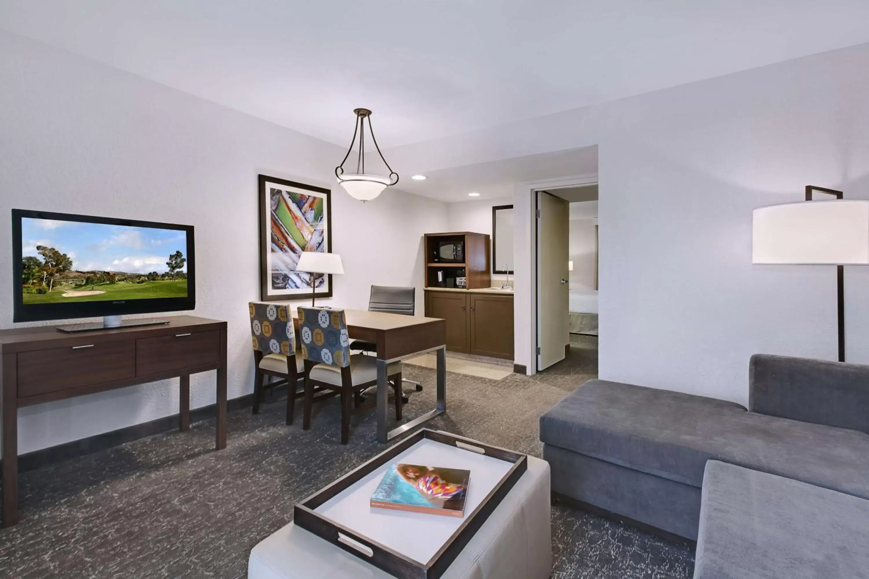 Living room, TV/Entertainment Center in Embassy Suites by Hilton Palm Desert