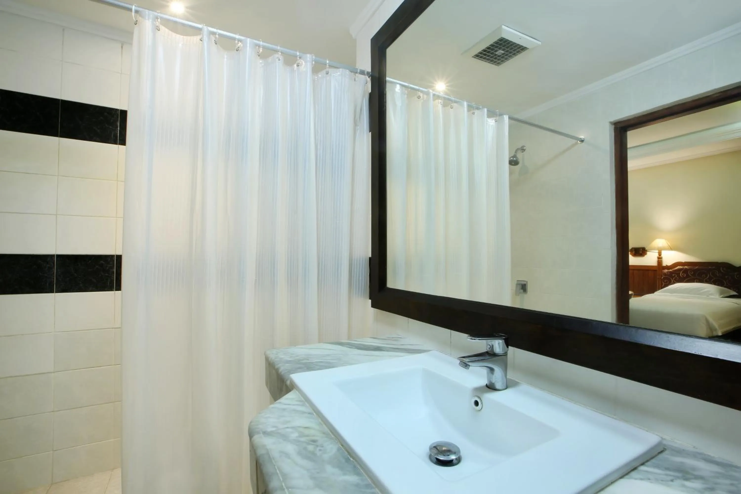 Photo of the whole room, Bed in Bali Bungalo Hotel