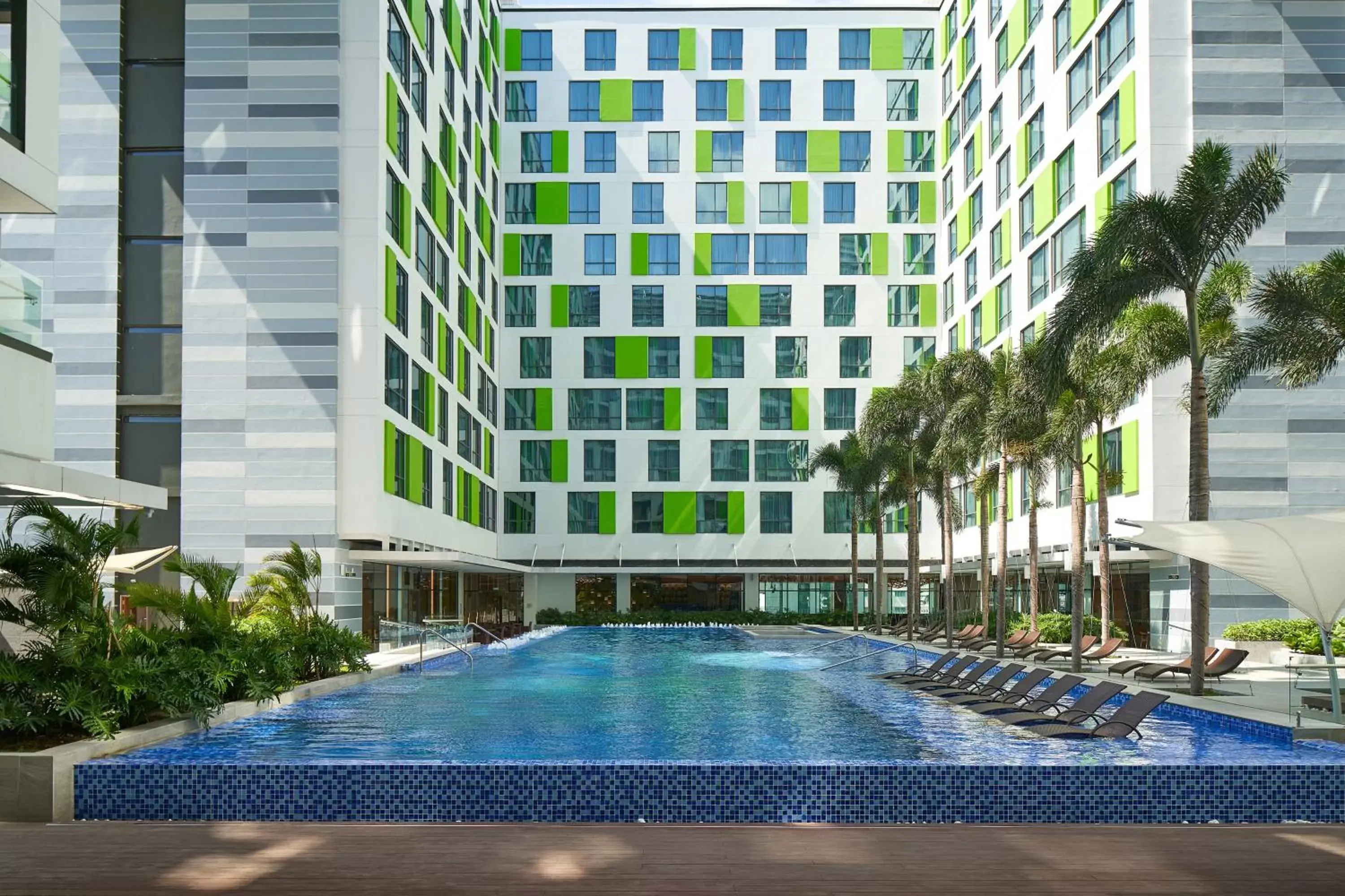 Property building, Swimming Pool in Holiday Inn & Suites Saigon Airport, an IHG Hotel