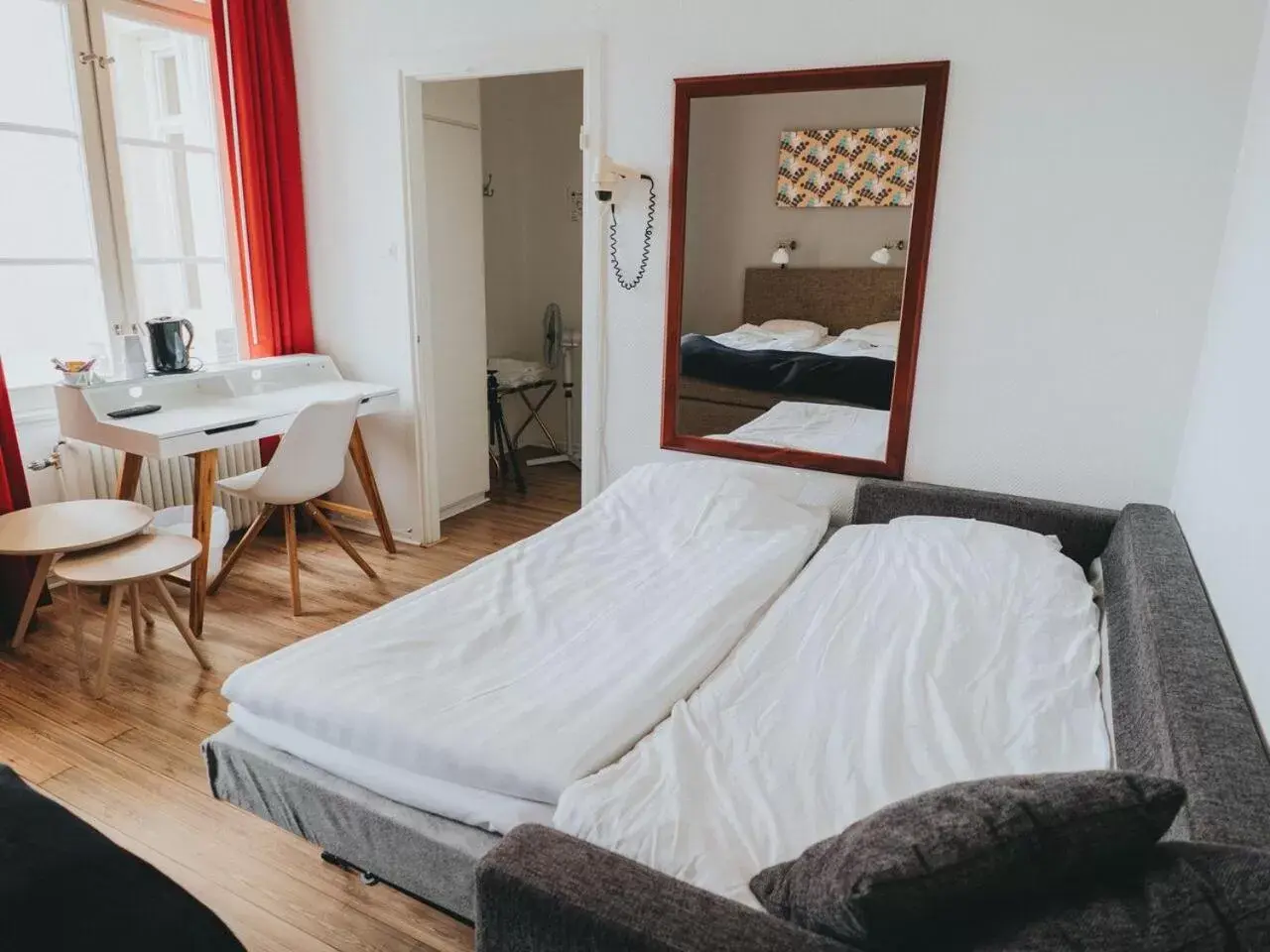 Photo of the whole room, Bed in Arboga Stadshotell Photo of the whole room, Bed in Arboga Stadshotell