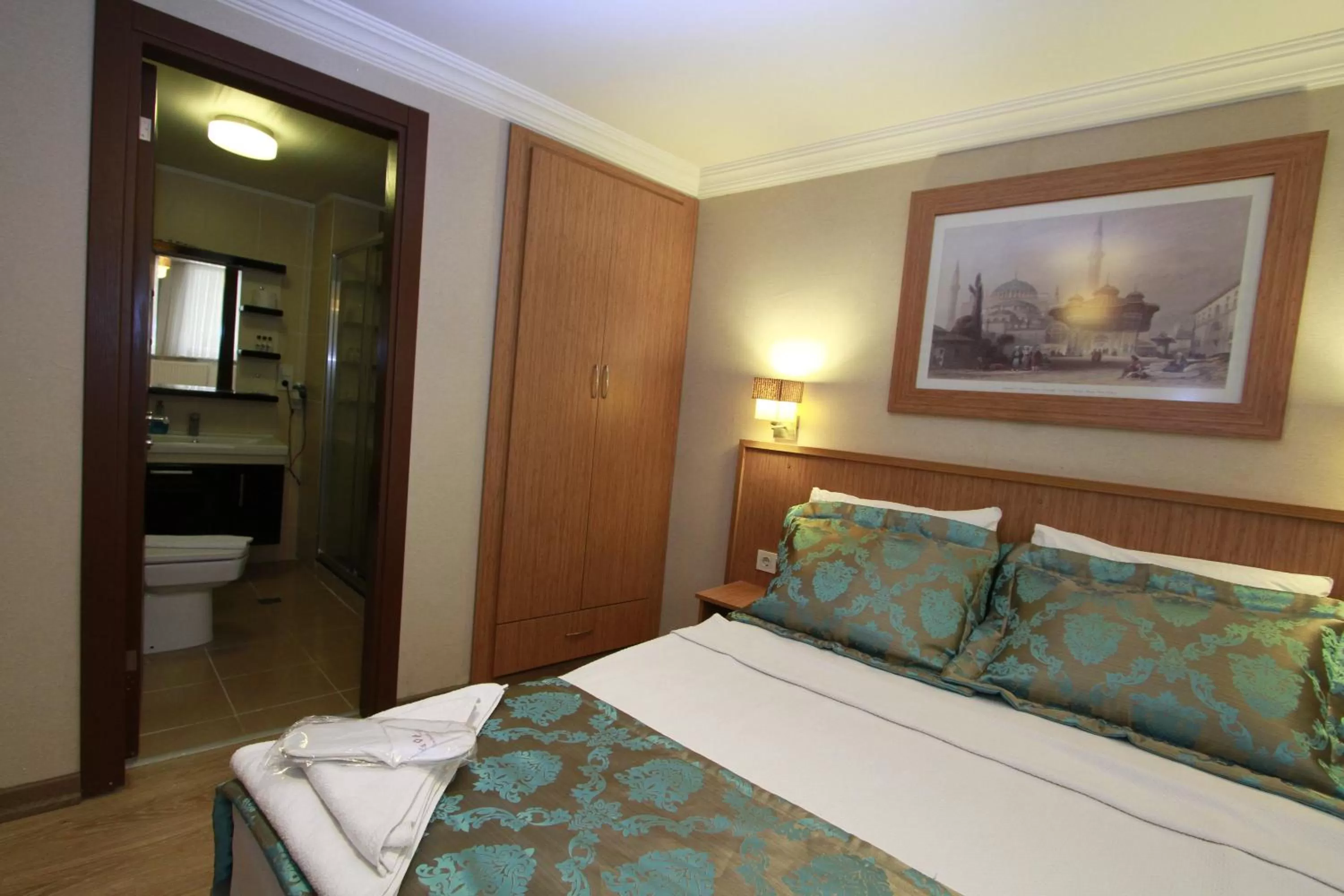 Bed in Agora Boutique Hotel & Bistro