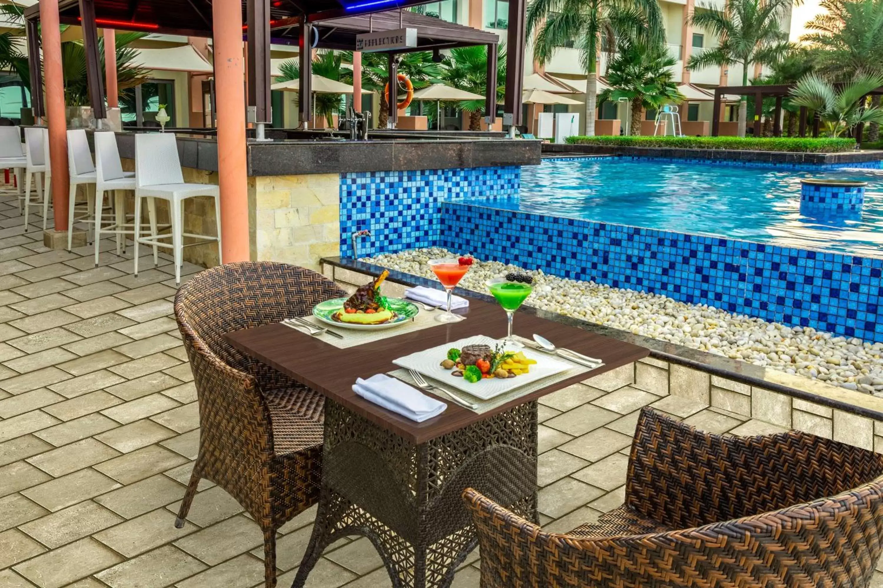 Lounge or bar, Swimming Pool in Radisson Blu Hotel Sohar