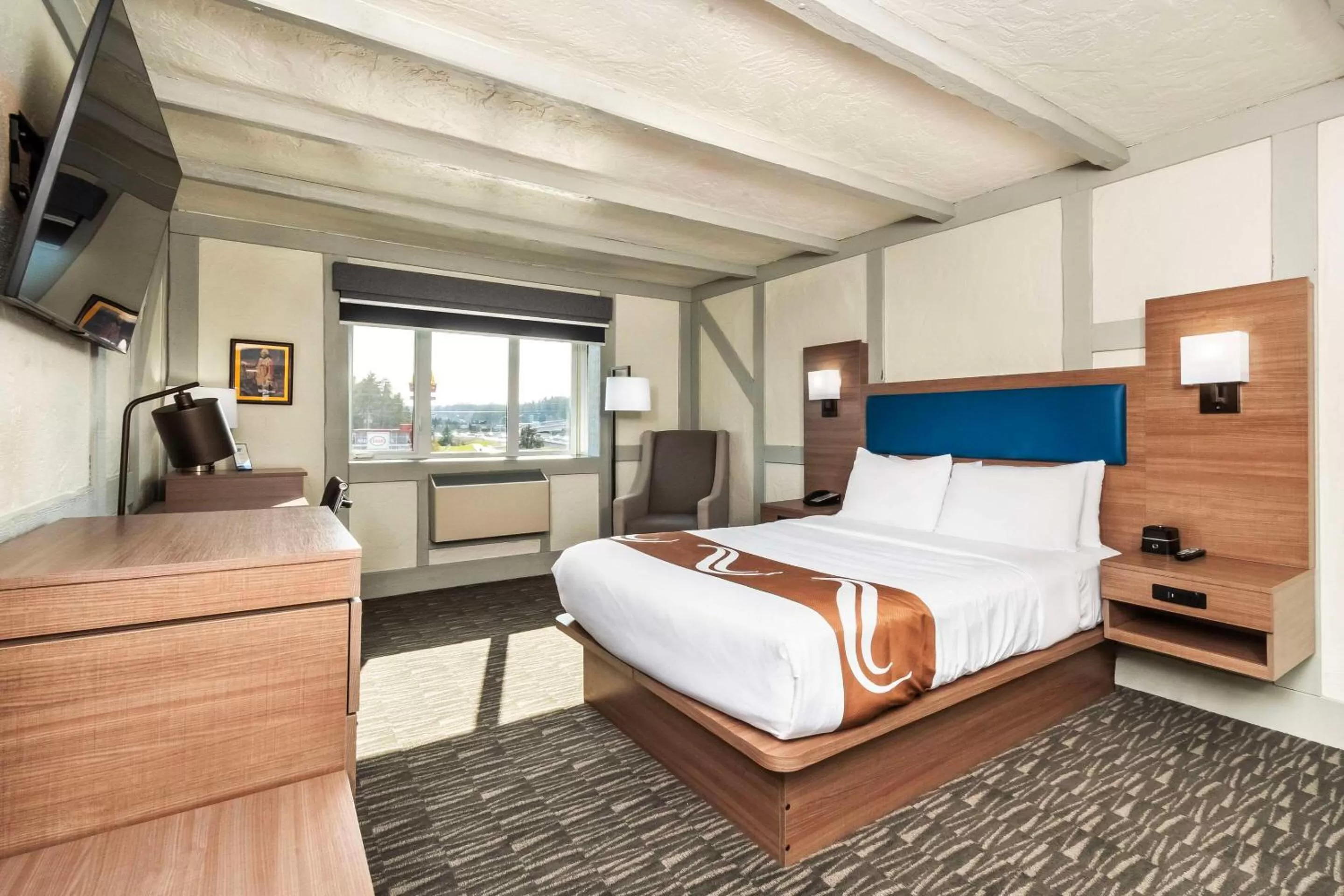 Bedroom, Bed in Quality Inn Waddling Dog