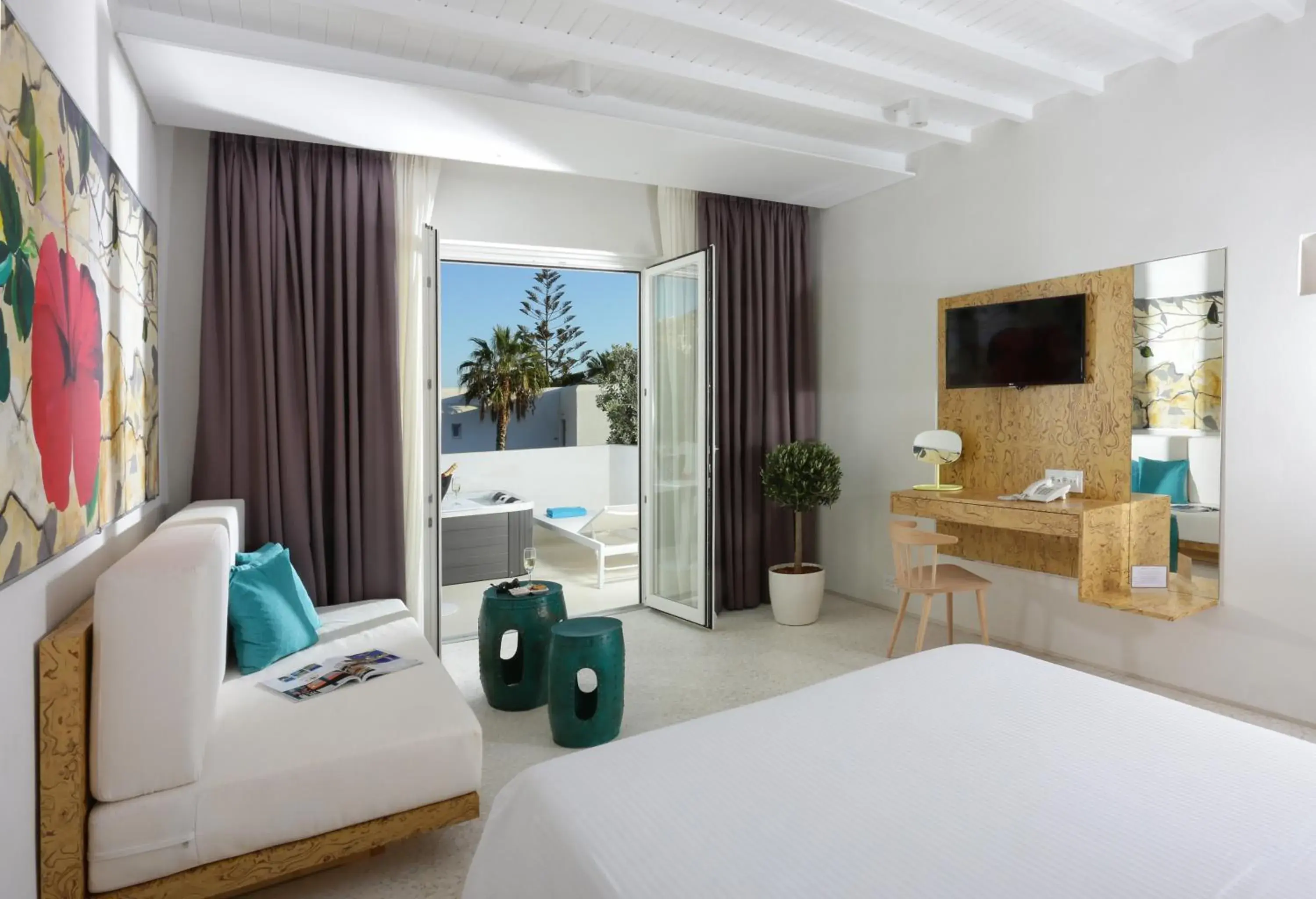 Bed, Seating Area in Mykonos Dove Beachfront Hotel