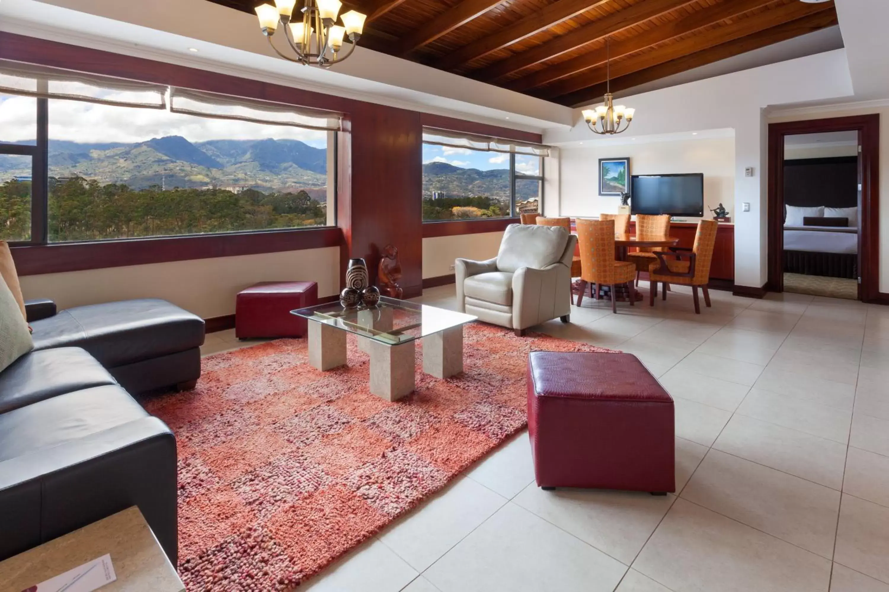 Bedroom, Seating Area in Crowne Plaza San Jose La Sabana, an IHG Hotel