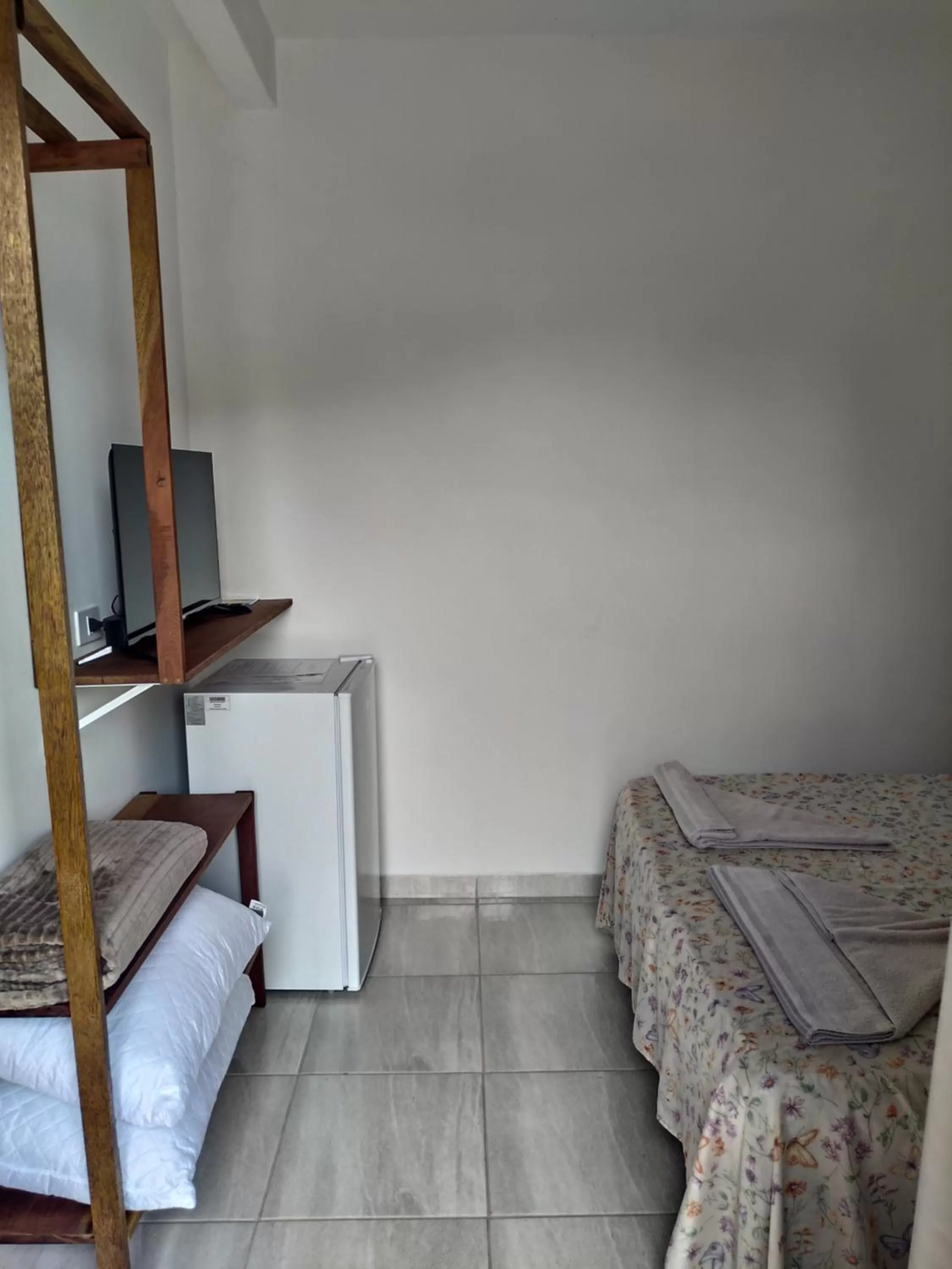 Bed in Pousada Na Praia Ubatuba