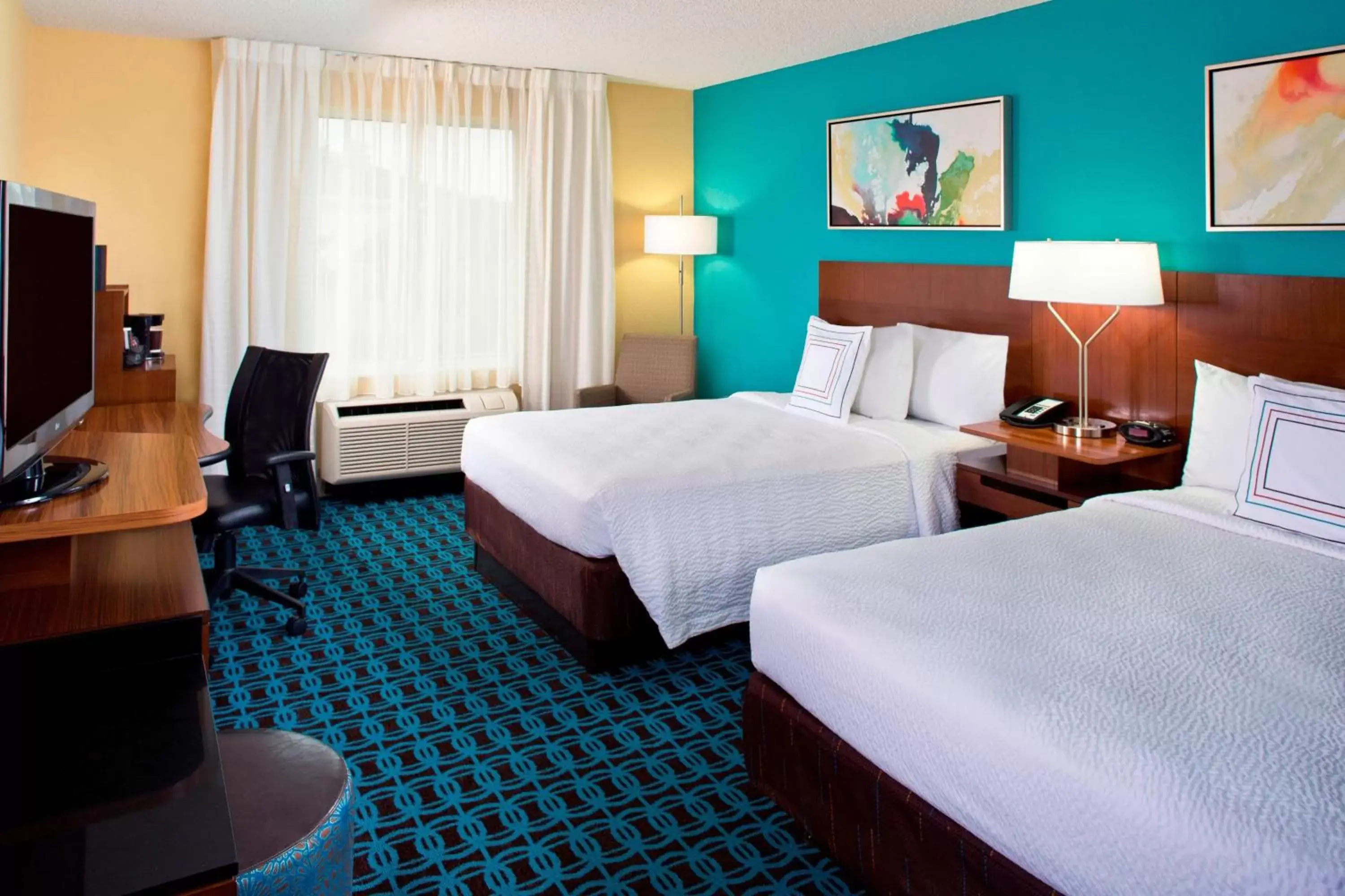 Photo of the whole room, Bed in Fairfield Inn & Suites by Marriott Orlando Lake Buena Vista in the Marriott Village
