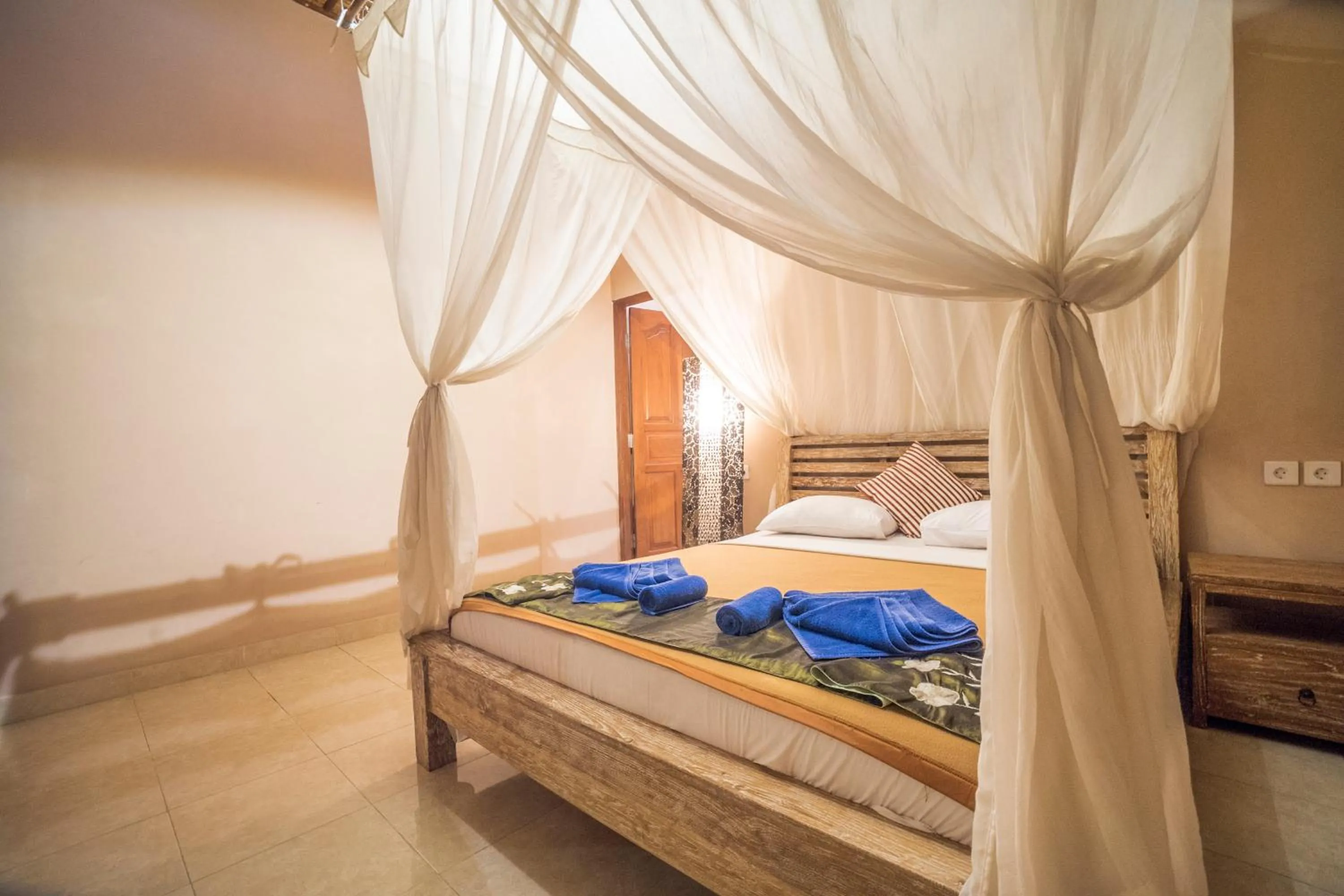 Bed in Gajah Biru Bungalows