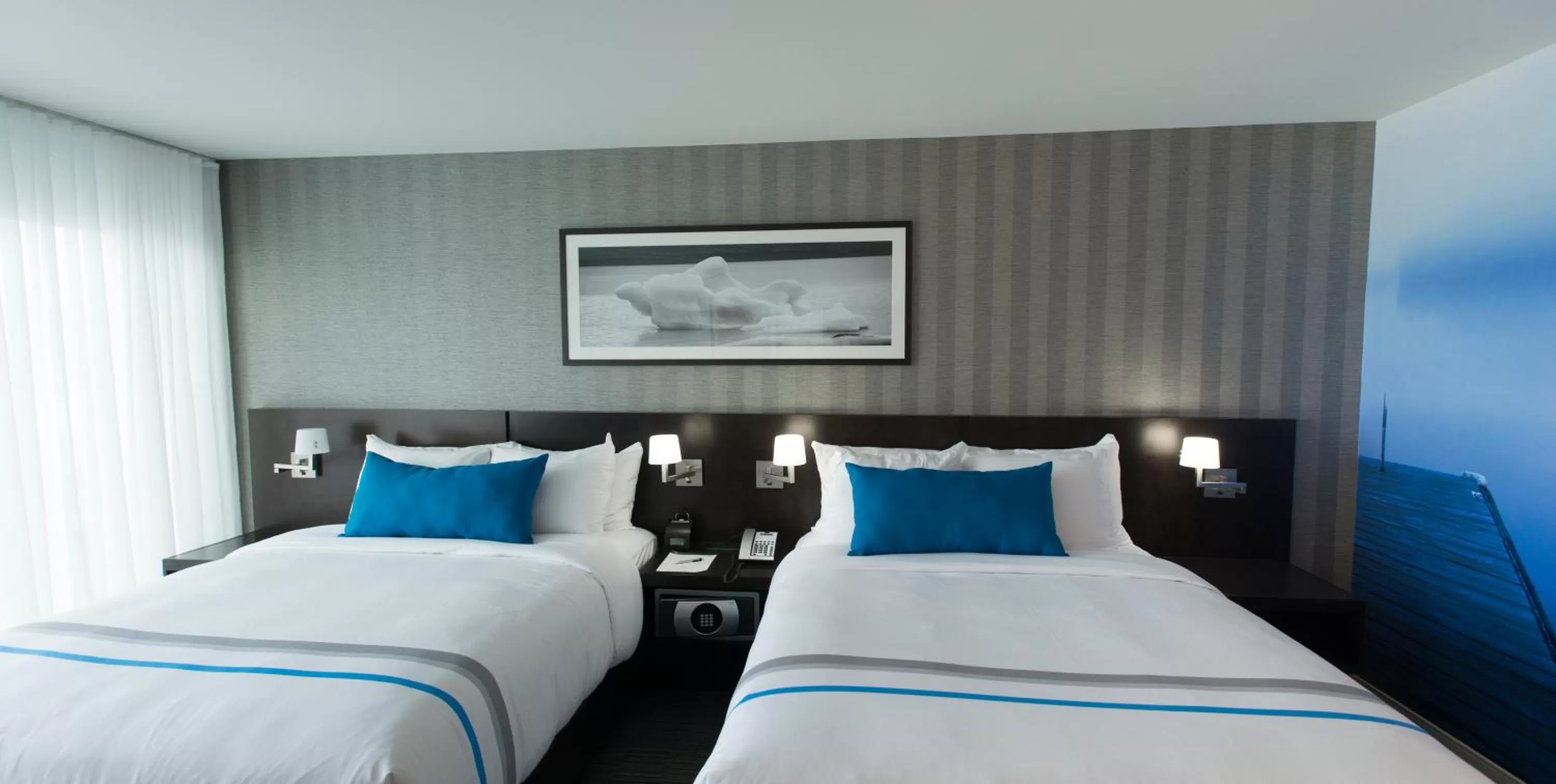 Bed in The Grand Winnipeg Airport Hotel by Lakeview